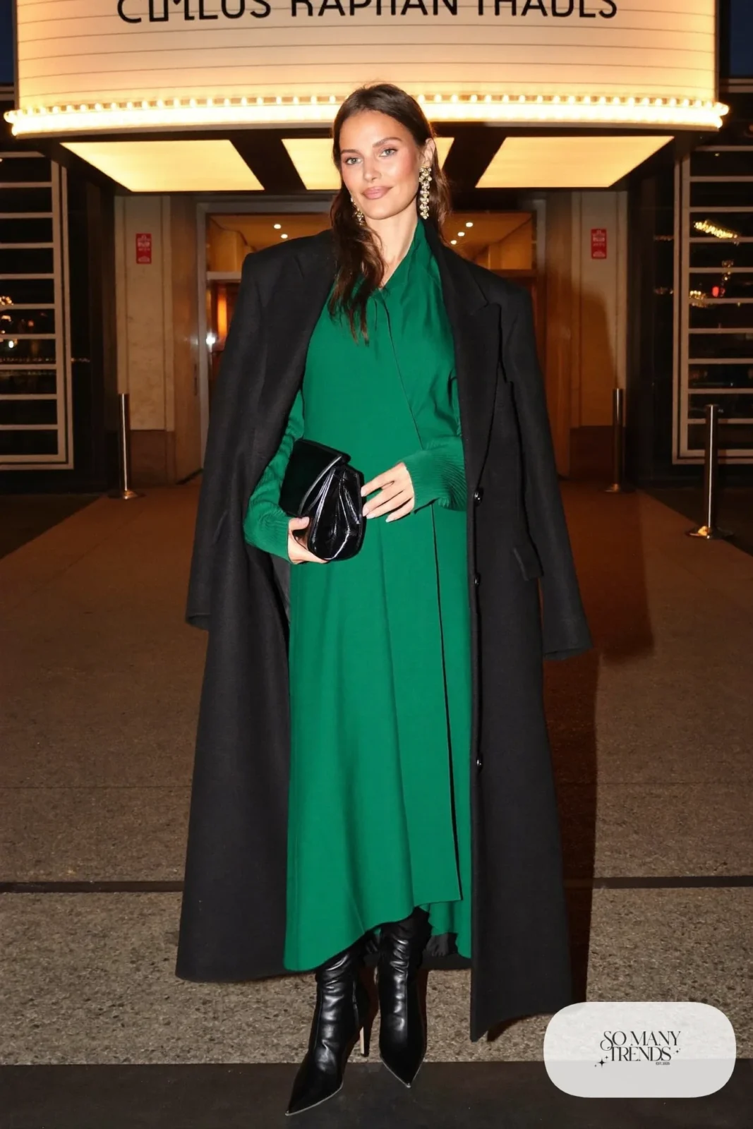 emerald green midi dress long black coat black heeled boots gold earrings outfit 31