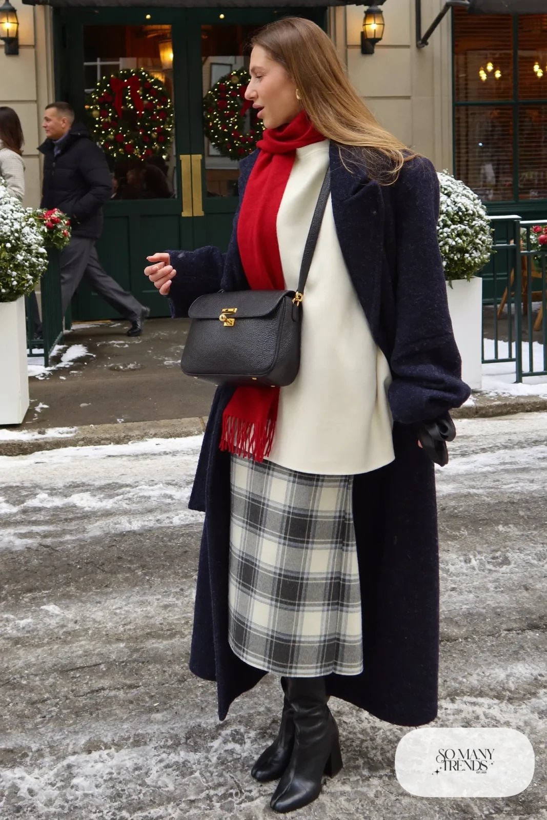 white mock neck top plaid wool midi skirt long navy peacoat black tall boots red scarf outfit 17