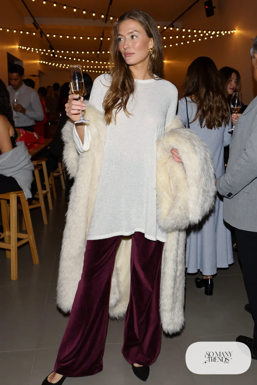 white glitter knit sweater burgundy velvet wide leg pants pointed flats faux fur stole gold earrings outfit 25