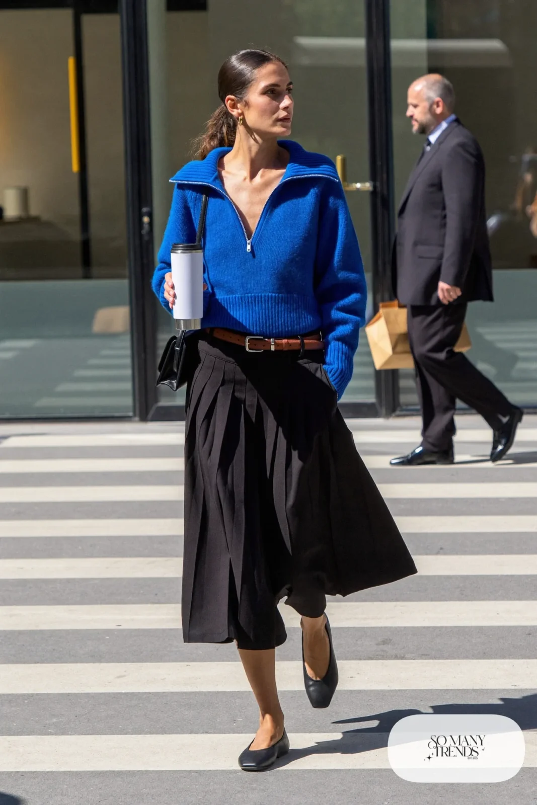 cobalt blue half-zip sweater black pleated midi skirt black ballet flats brown belt crossbody bag outfit 4