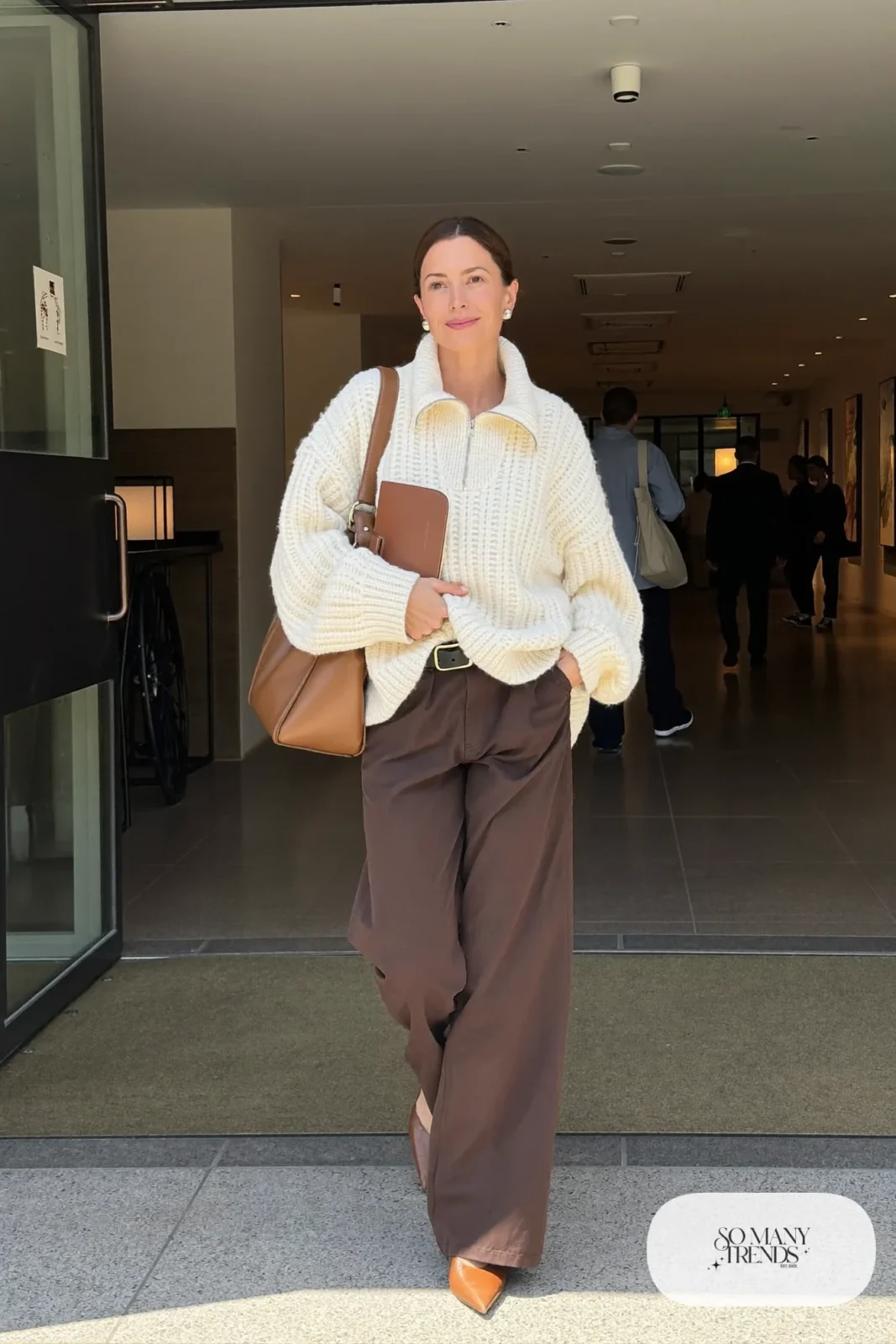 cream half-zip sweater chocolate brown wide-leg pants pointed brown flats black leather belt structured bag outfit 5