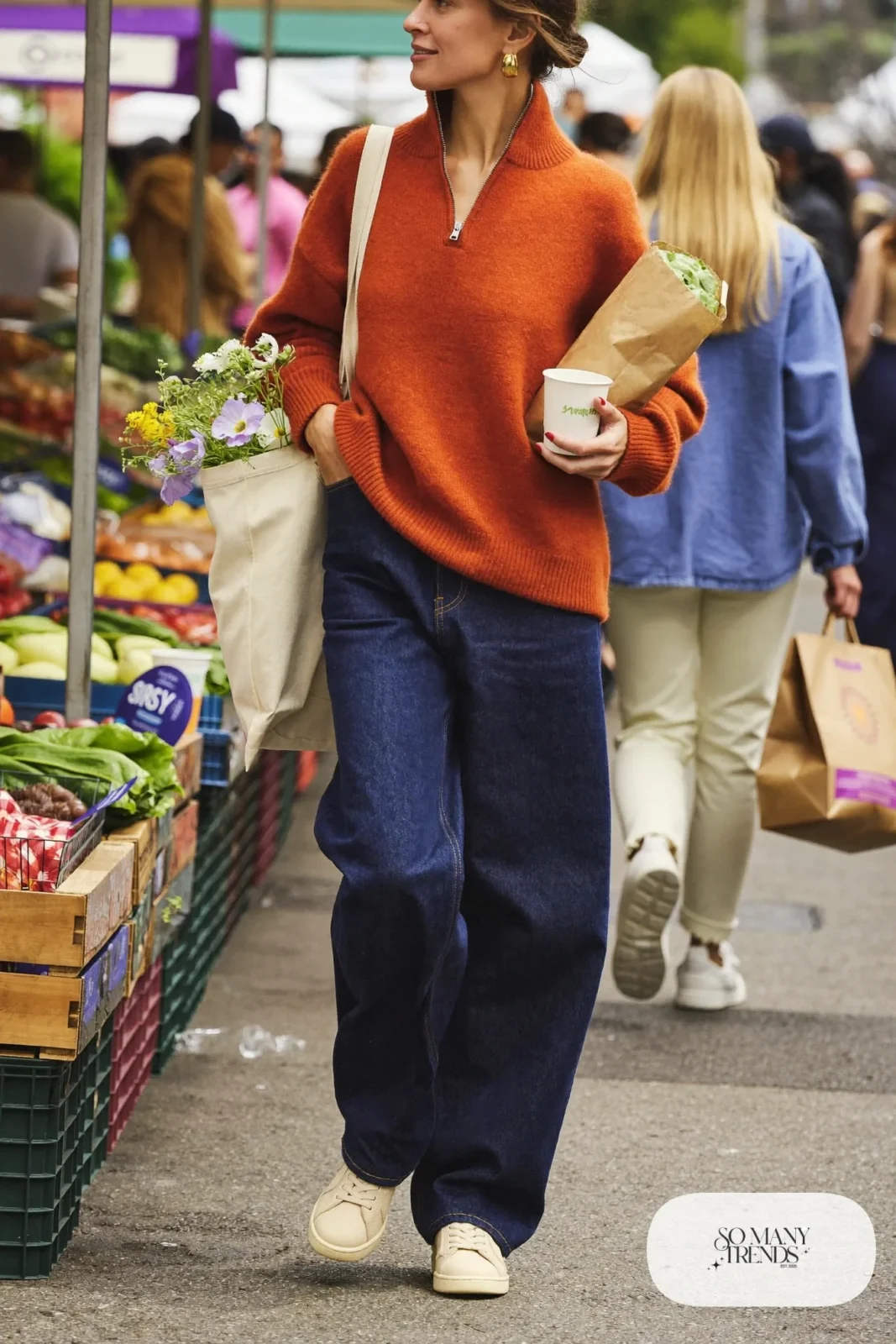 rust half-zip sweater dark indigo wide-leg jeans cream leather sneakers canvas tote gold hoops outfit 7