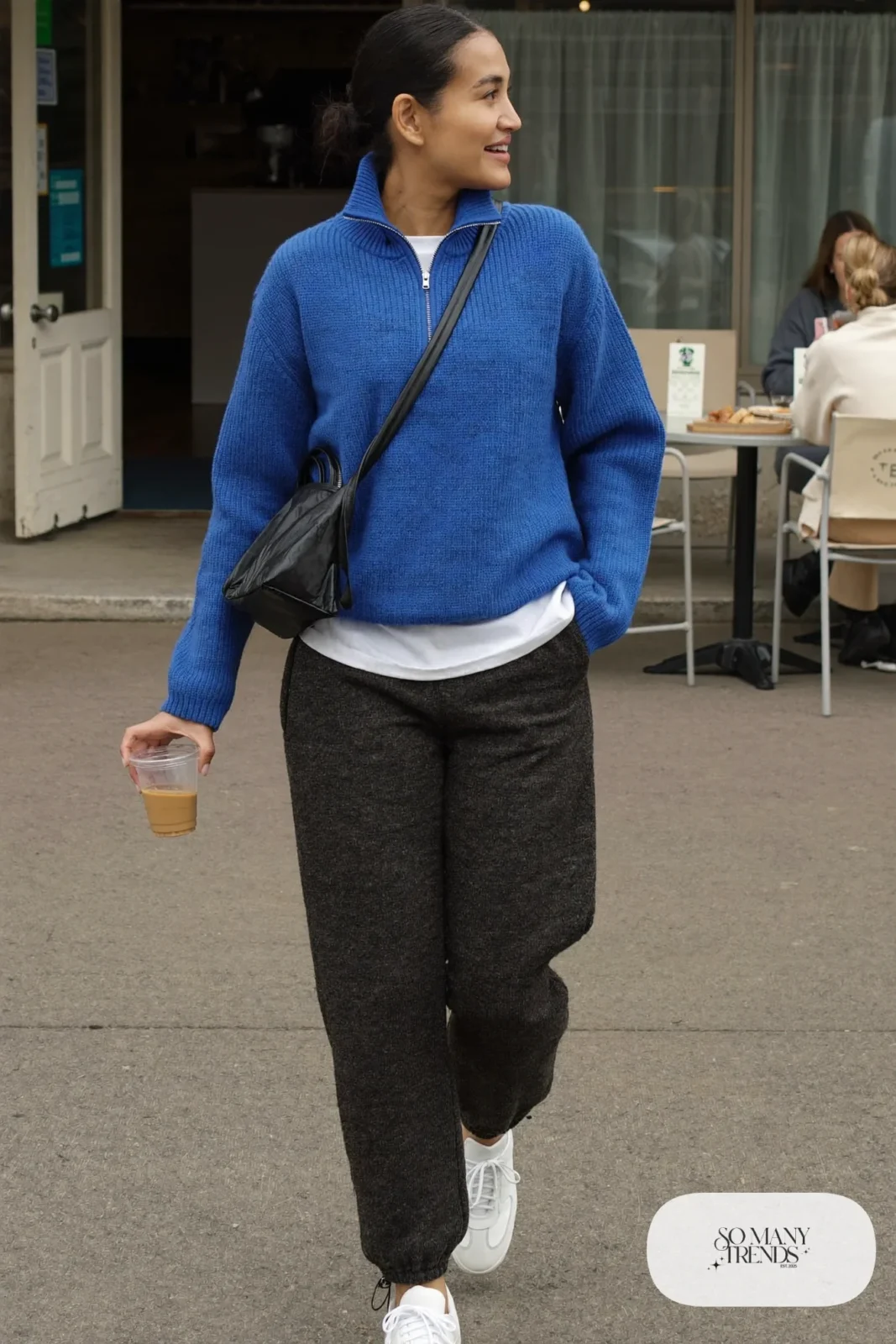 cobalt blue half-zip sweater white tee gray tapered joggers white sneakers black nylon crossbody outfit 12