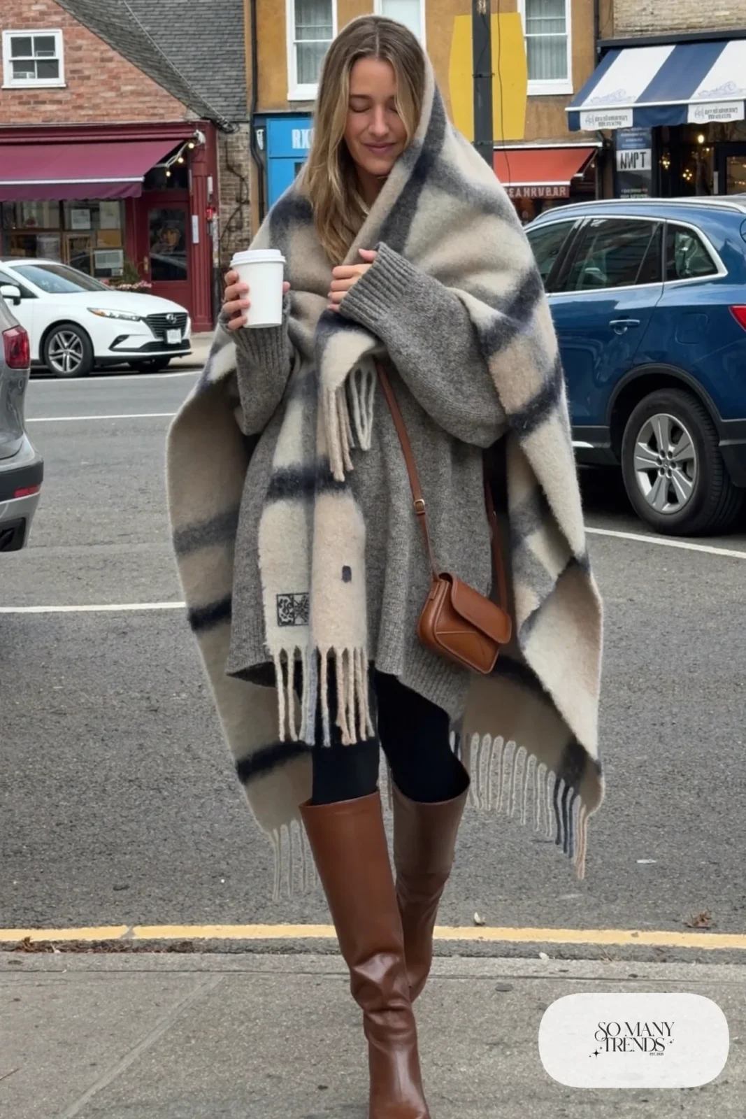 oversized plaid blanket scarf worn poncho style gray sweater black leggings brown boots outfit 14