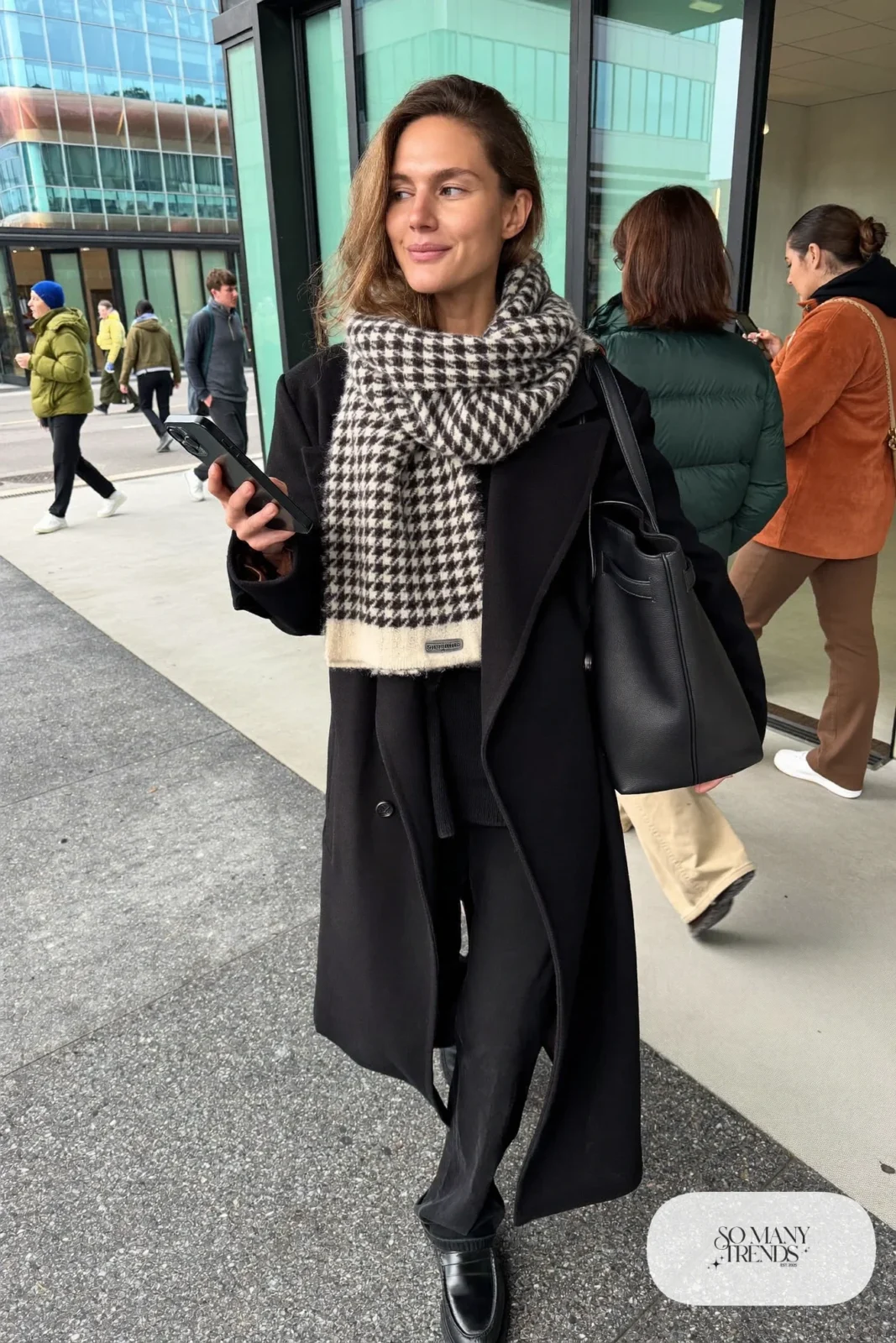 black wool coat houndstooth scarf black sweater black pants black loafers outfit 17
