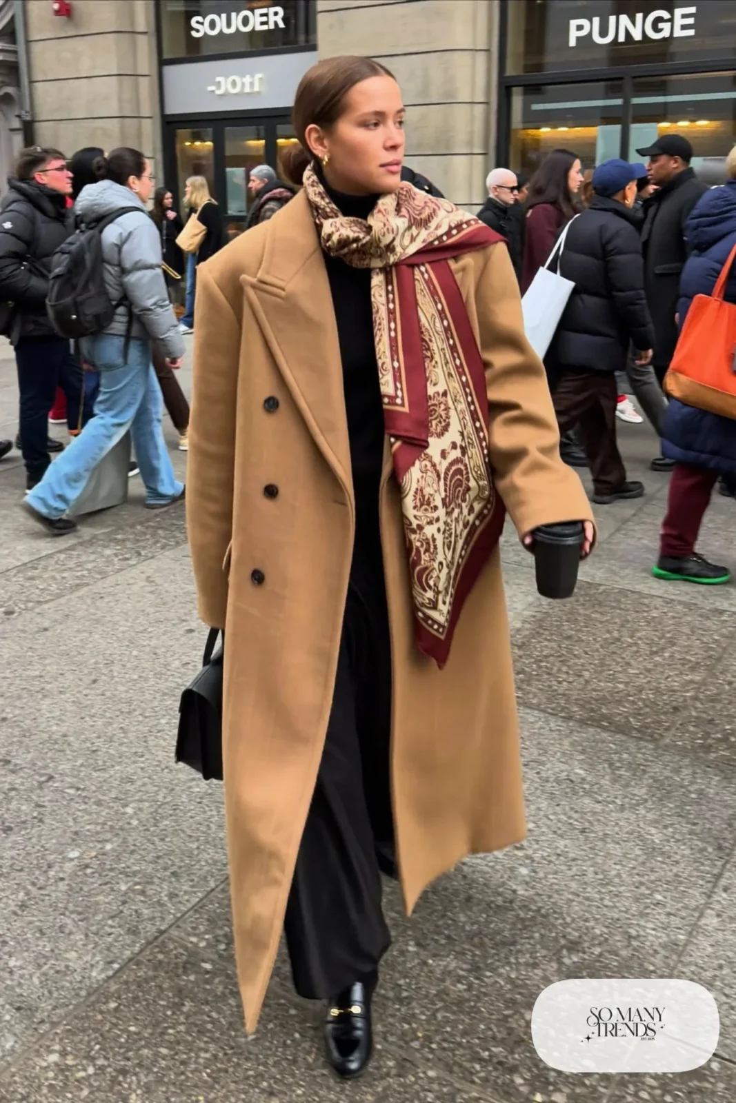 camel long coat burgundy silk neck scarf black turtleneck wide-leg black pants loafers outfit 19