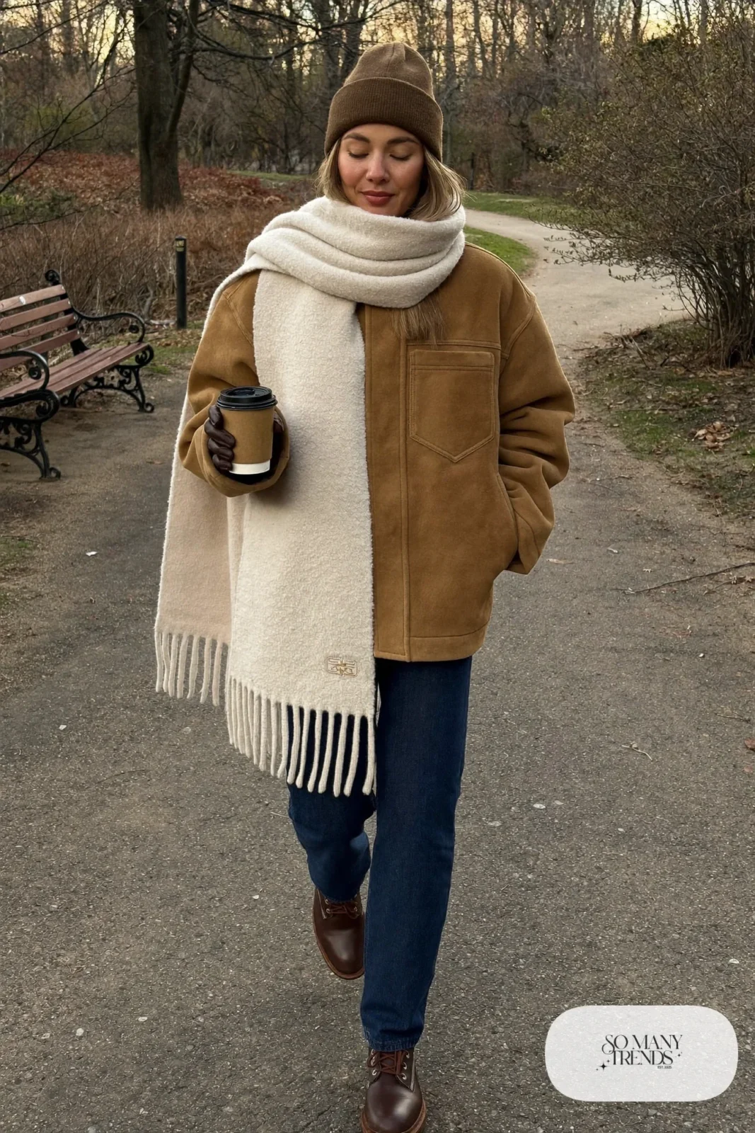 tan shearling jacket chunky cream scarf straight dark jeans lace-up boots beanie outfit 27