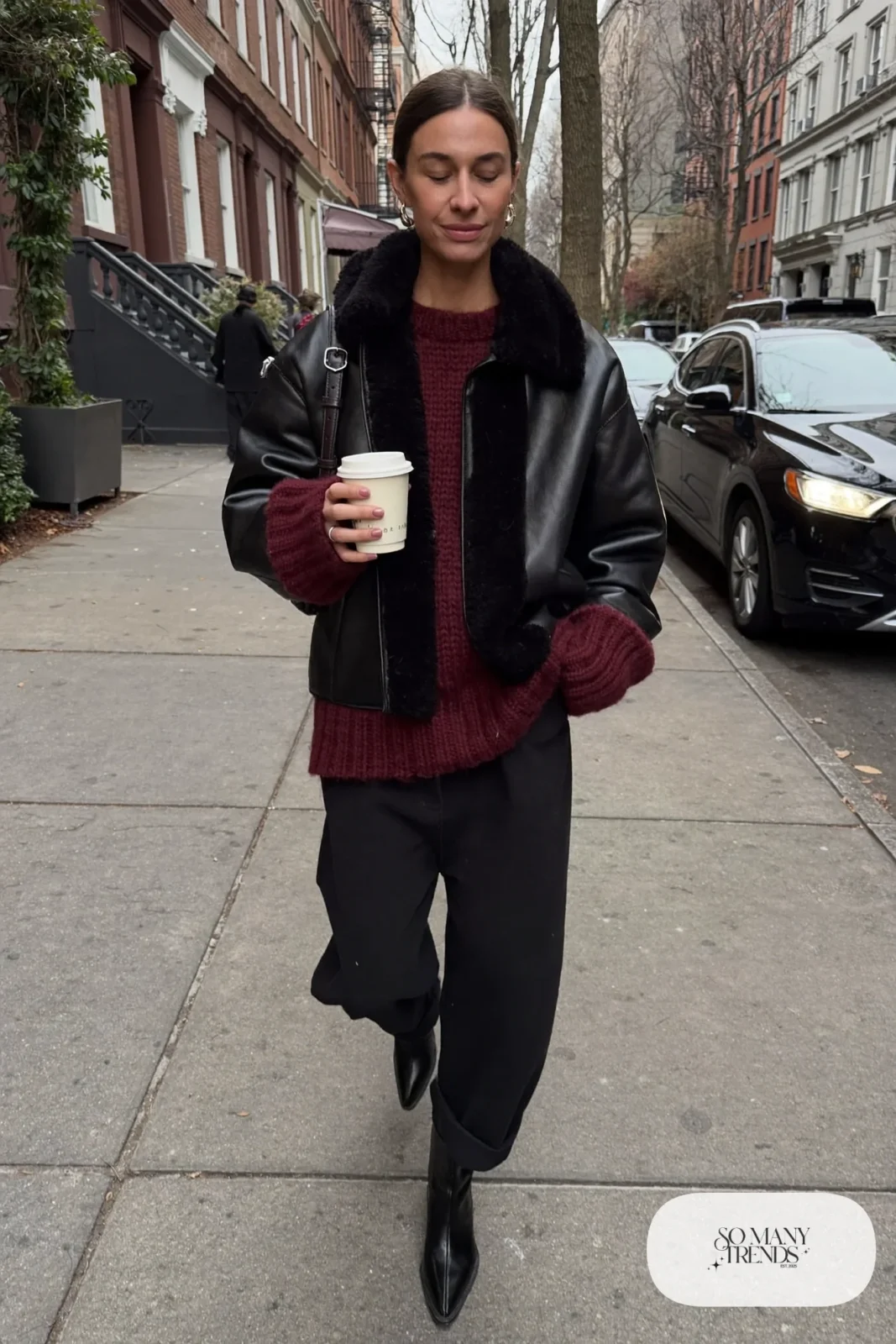 burgundy chunky sweater wide-leg black pants pointed ankle boots shearling jacket outfit 2