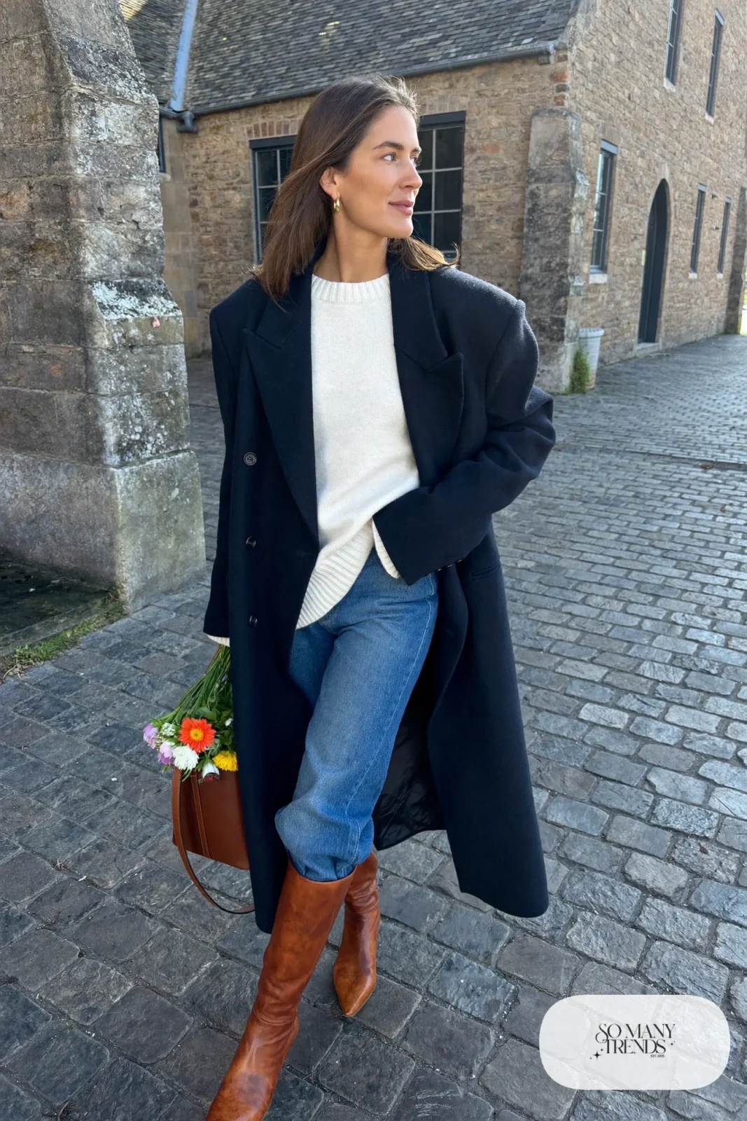 navy peacoat cream chunky sweater straight jeans tucked cognac riding boots tote outfit 11