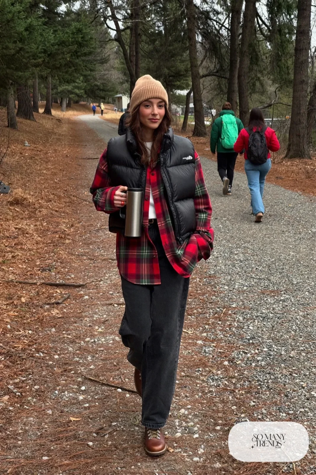 plaid flannel shirt black puffer vest dark jeans brown hiking ankle boots beanie outfit 33