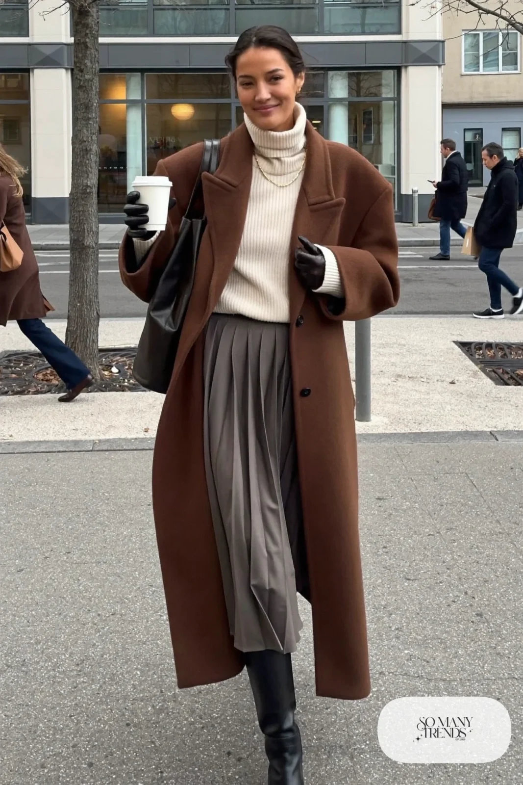 charcoal gray pleated midi skirt camel wool coat white turtleneck black ankle boots black tote outfit 1