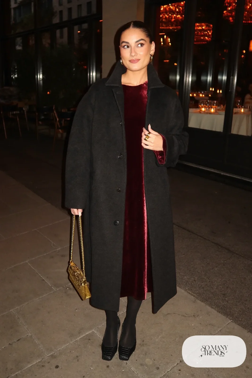 burgundy velvet midi dress oversized black wool coat black pumps sheer tights gold chain bag outfit 1