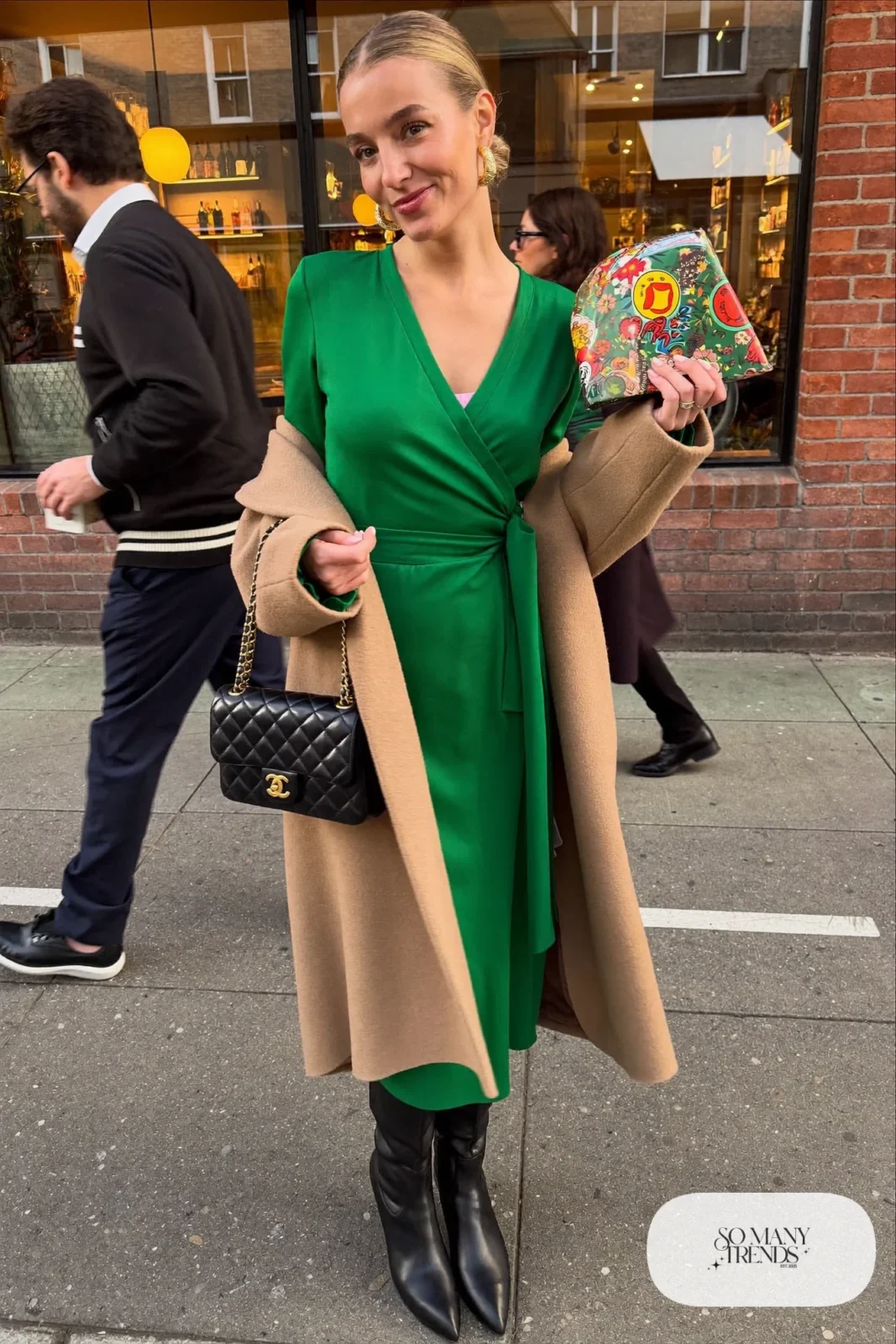 emerald green wrap midi dress black knee-high boots camel coat gold earrings outfit 3