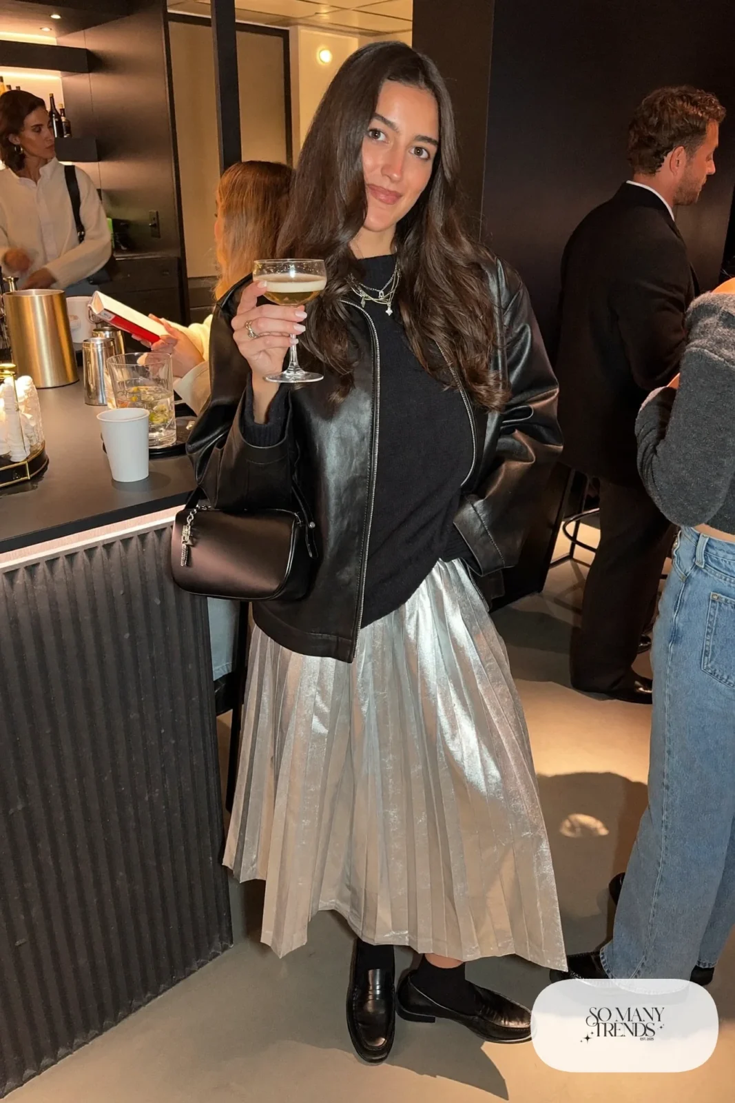 silver metallic pleated midi skirt black merino sweater black loafers leather jacket outfit 7