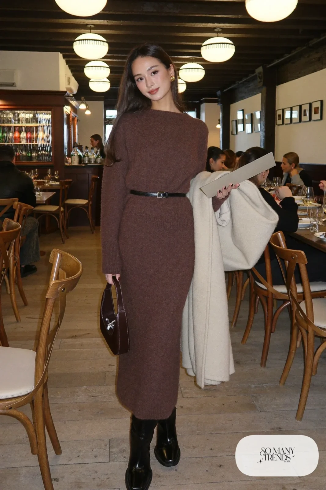 chocolate brown knit sweater midi skirt set belt tall black boots long coat gold earrings outfit 28