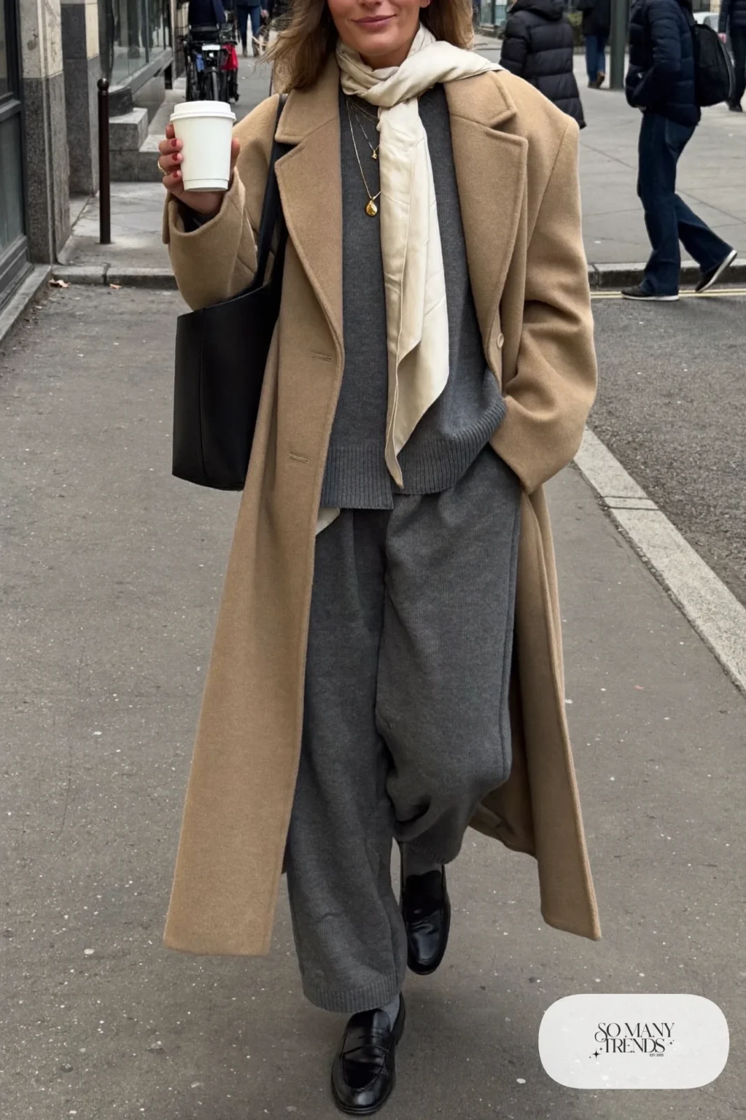camel oversized wool coat charcoal ribbed knit sweater wide-leg knit pants black loafers cream scarf outfit 1