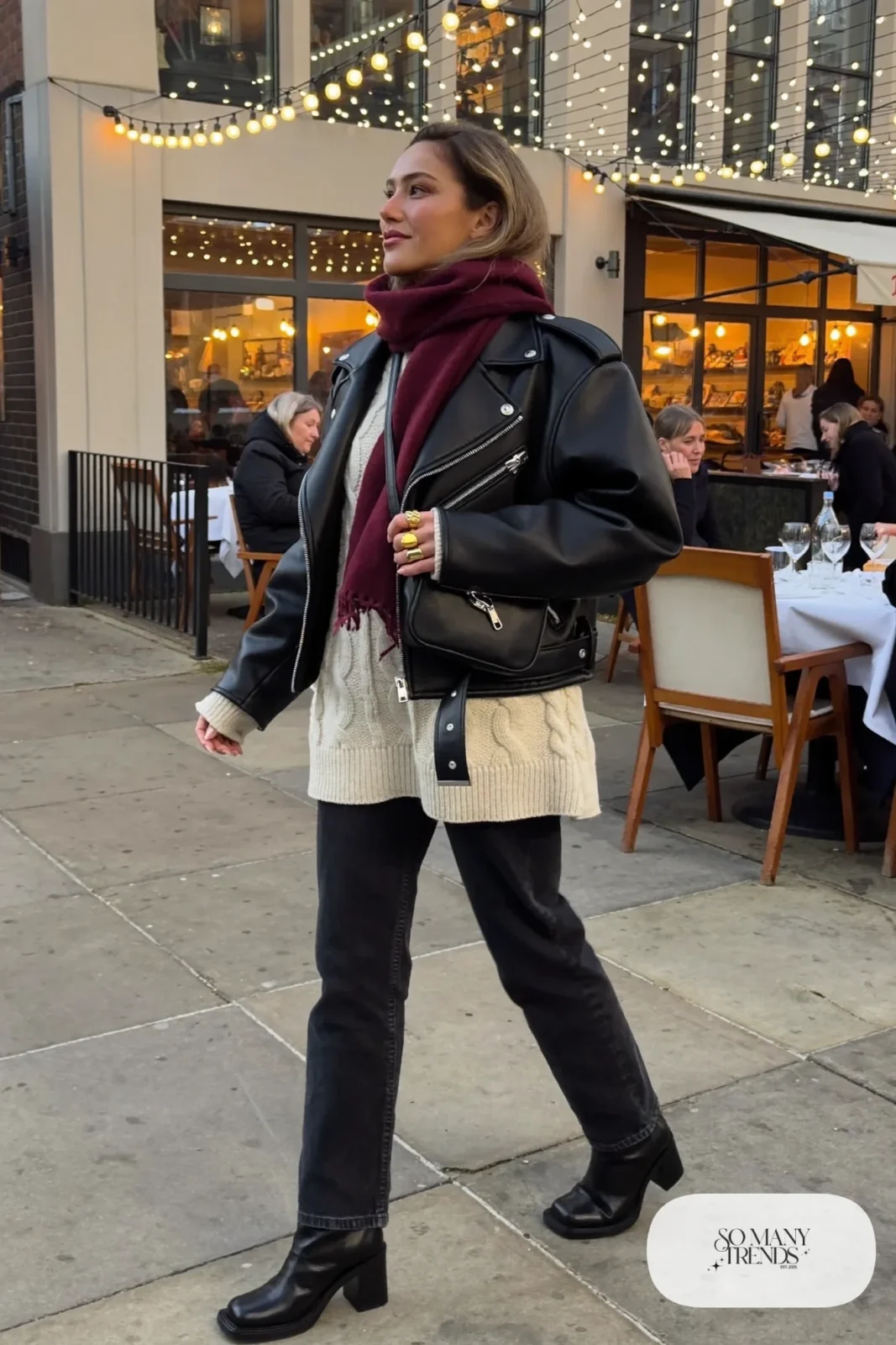 boxy black faux leather jacket ivory cable knit sweater black straight jeans black block-heel ankle boots burgundy scarf outfit 16