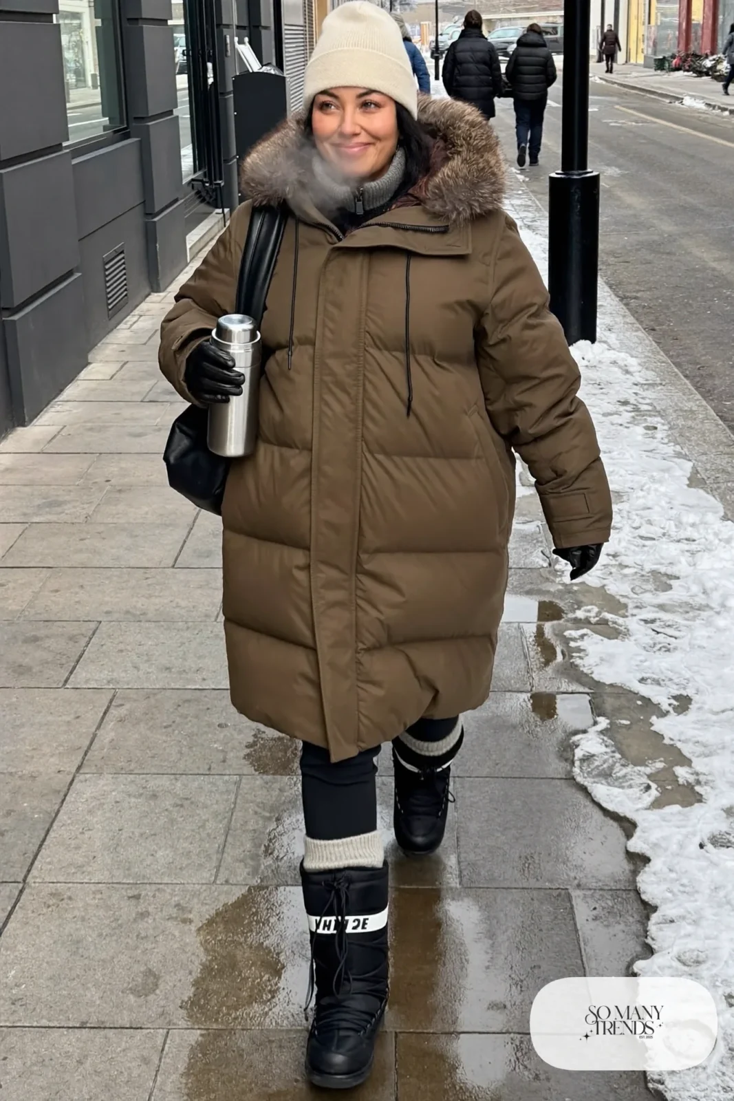 oversized olive green long down parka fur-trimmed hood gray merino turtleneck black fleece-lined pants insulated snow boots beanie outfit 27