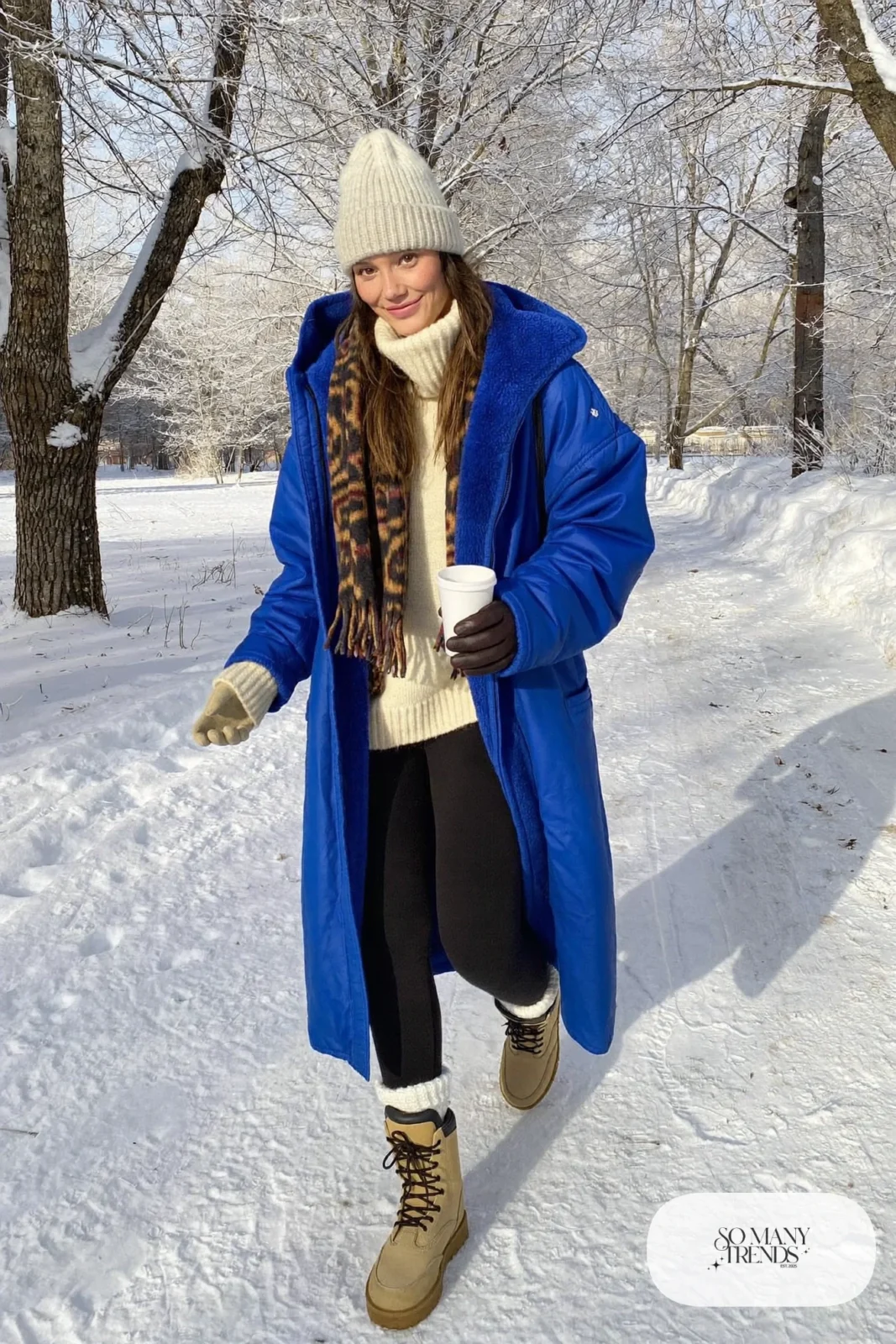 cobalt blue sherpa-lined canvas chore coat cream chunky sweater black fleece-lined leggings tan waterproof winter boots gray beanie outfit 28