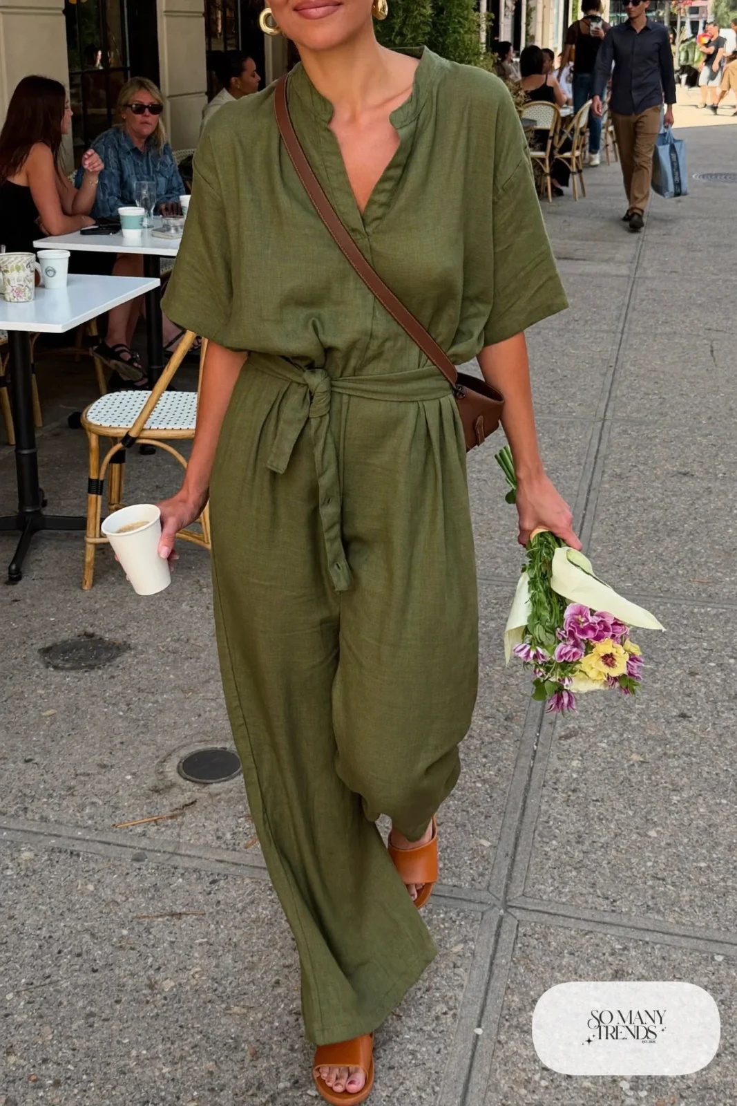 olive wide-leg jumpsuit V-neck tie waist leather slides gold hoops crossbody outfit 9