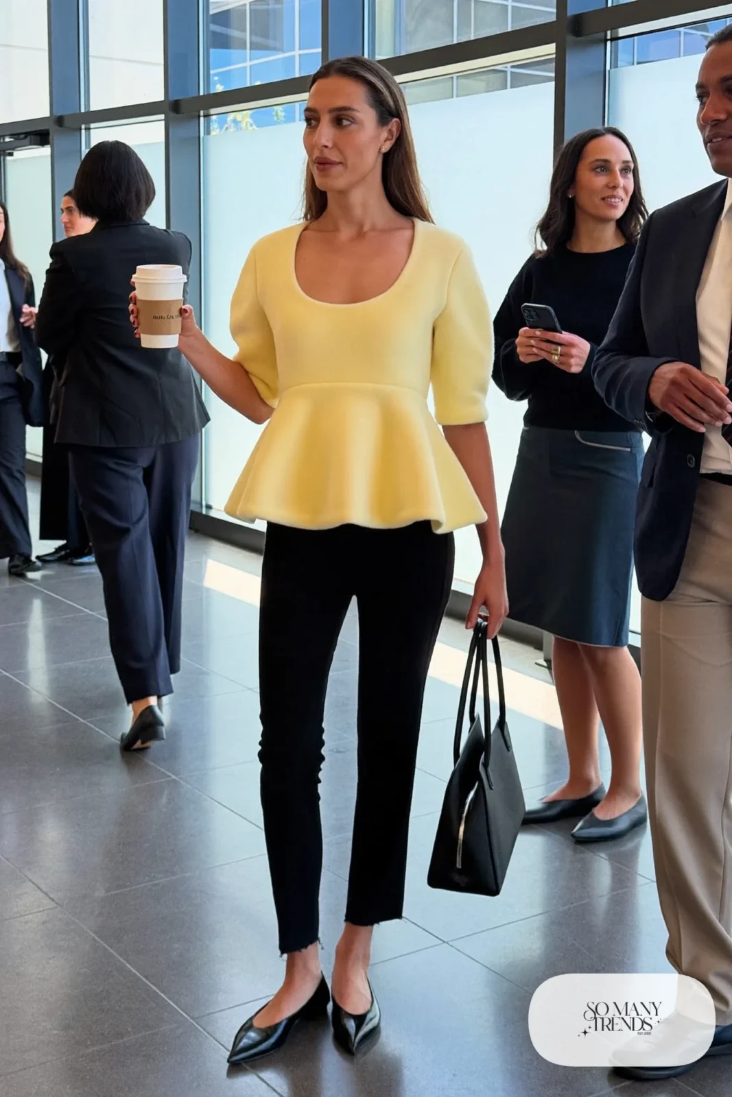 butter yellow peplum blouse black slim pants pointed flats leather tote outfit 10