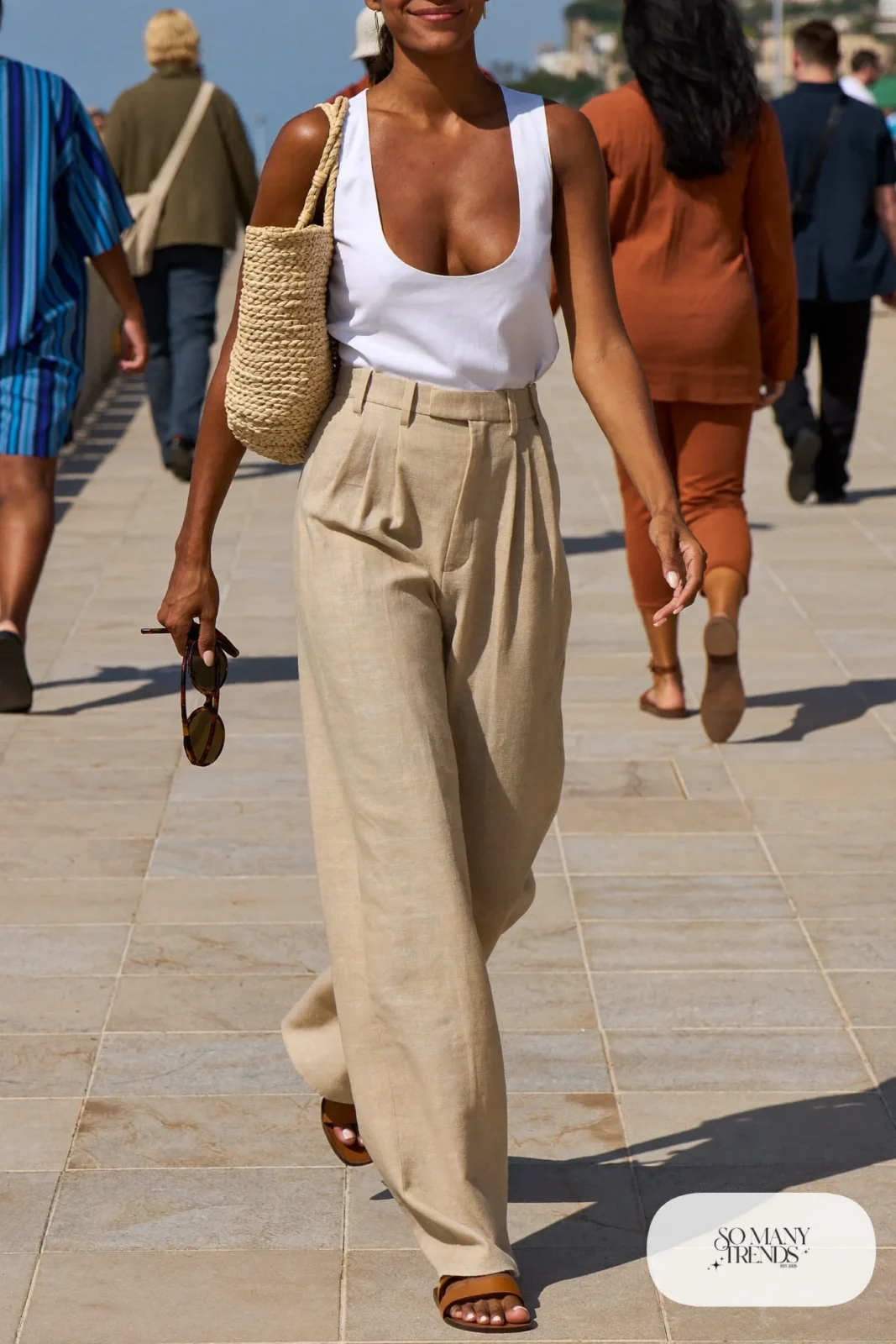 oatmeal wide-leg linen pants white scoop-neck shell tan sandals straw bag outfit 19