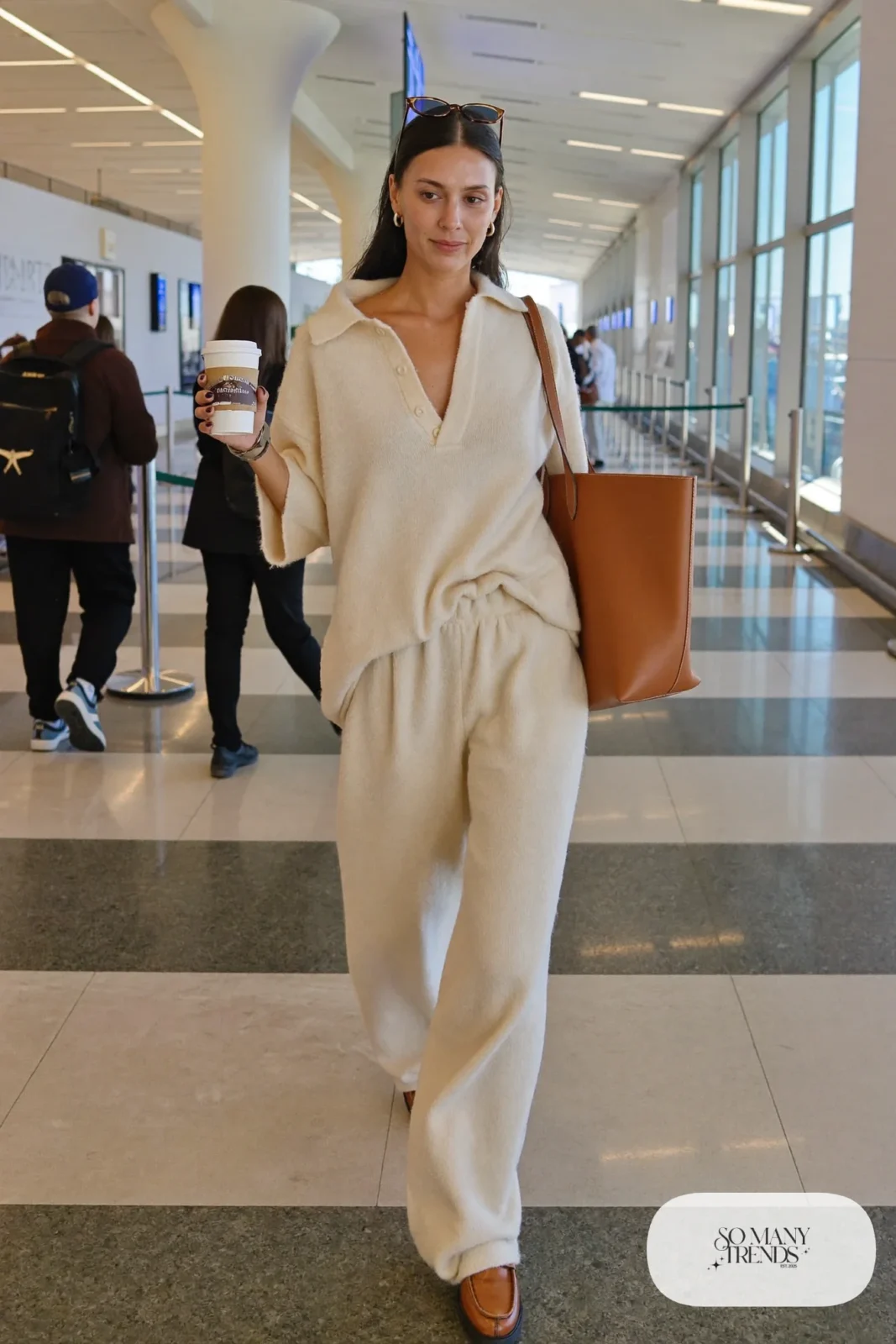 cream knit V-neck top matching wide-leg knit pants tan loafers leather tote outfit 27