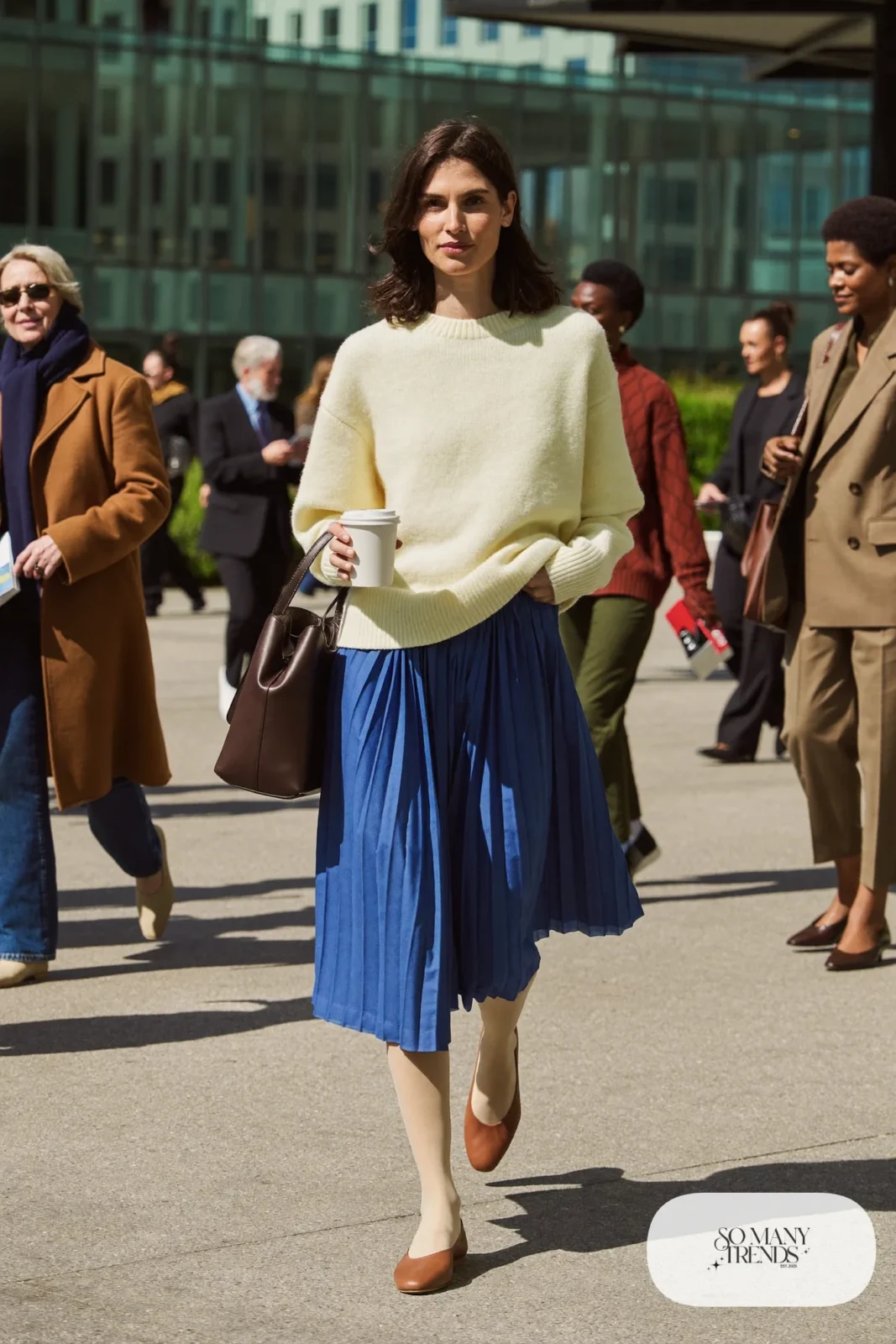cobalt pleated midi skirt cream crewneck sweater tan ankle boots leather tote outfit 28