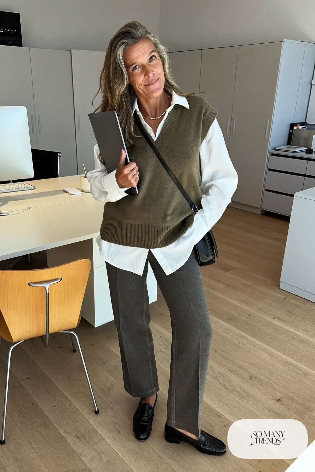 olive knit vest white poplin shirt charcoal straight pants black loafers crossbody bag outfit 2