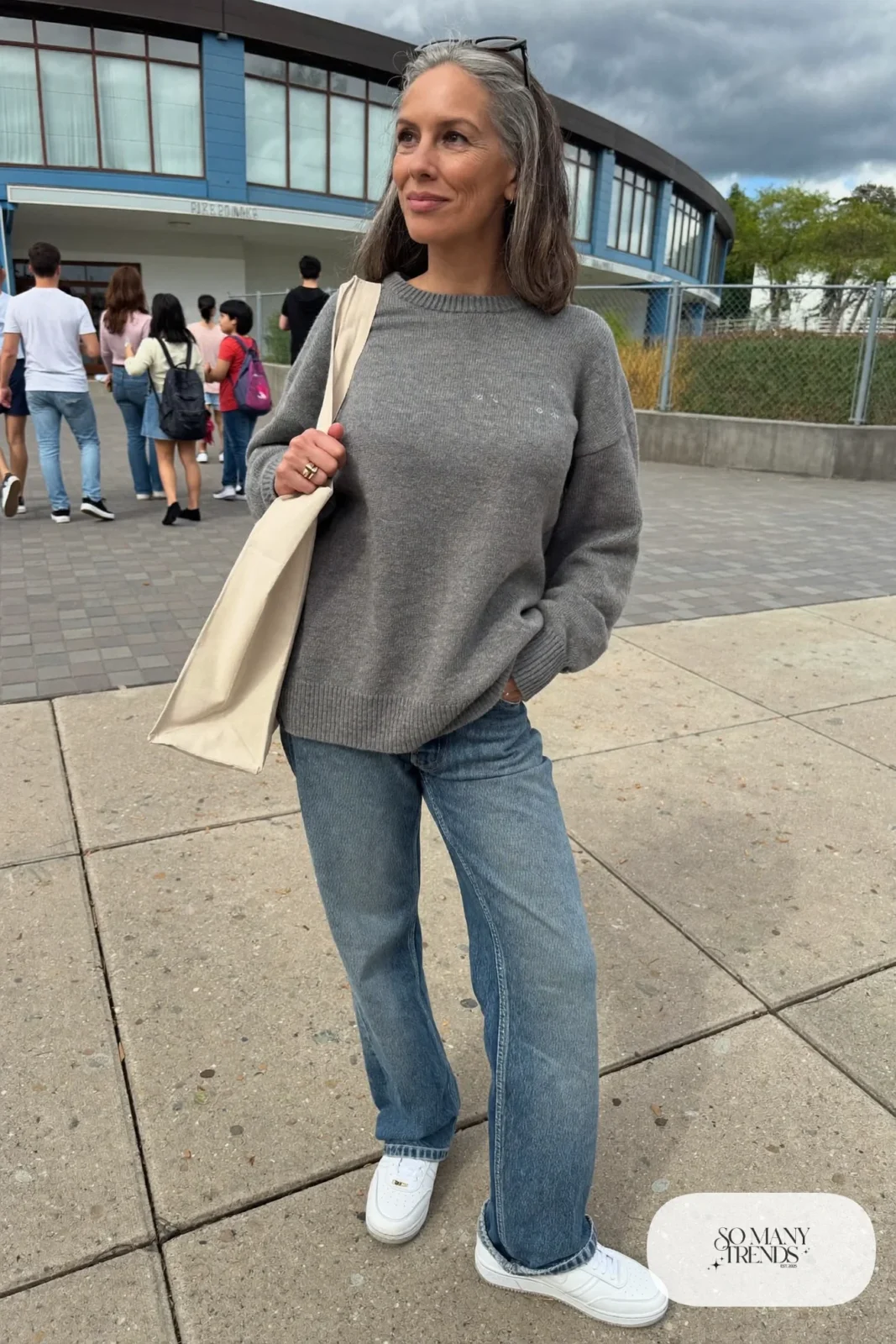 gray roomy sweater barrel leg jeans white leather sneakers canvas tote outfit 8