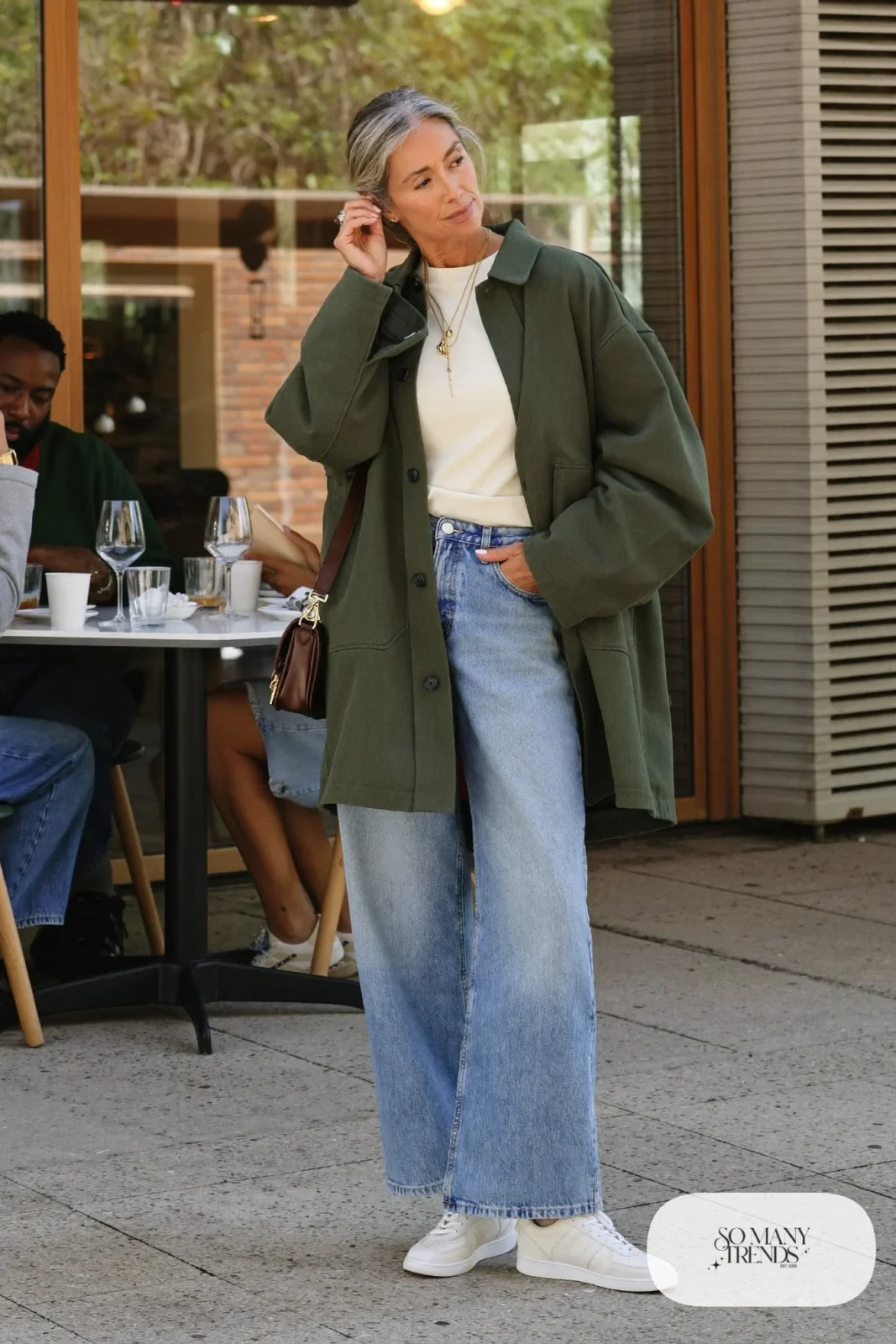 olive shirt jacket cream tee layered gold necklaces wide-leg jeans sneakers crossbody bag outfit 31