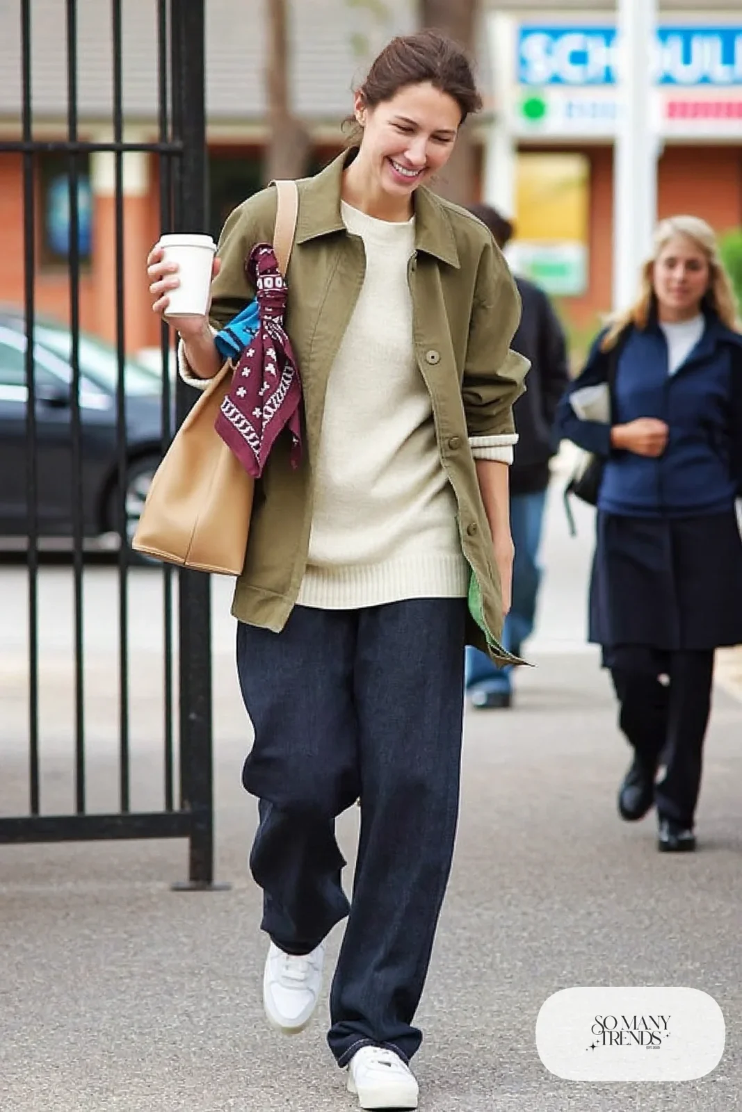 olive utility jacket cream knit wide-leg dark jeans white sneakers camel tote school run outfit 1