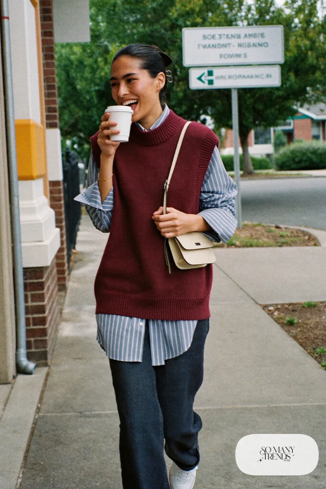 burgundy knit vest blue striped shirt dark straight jeans leather sneakers crossbody bag school run outfit 5