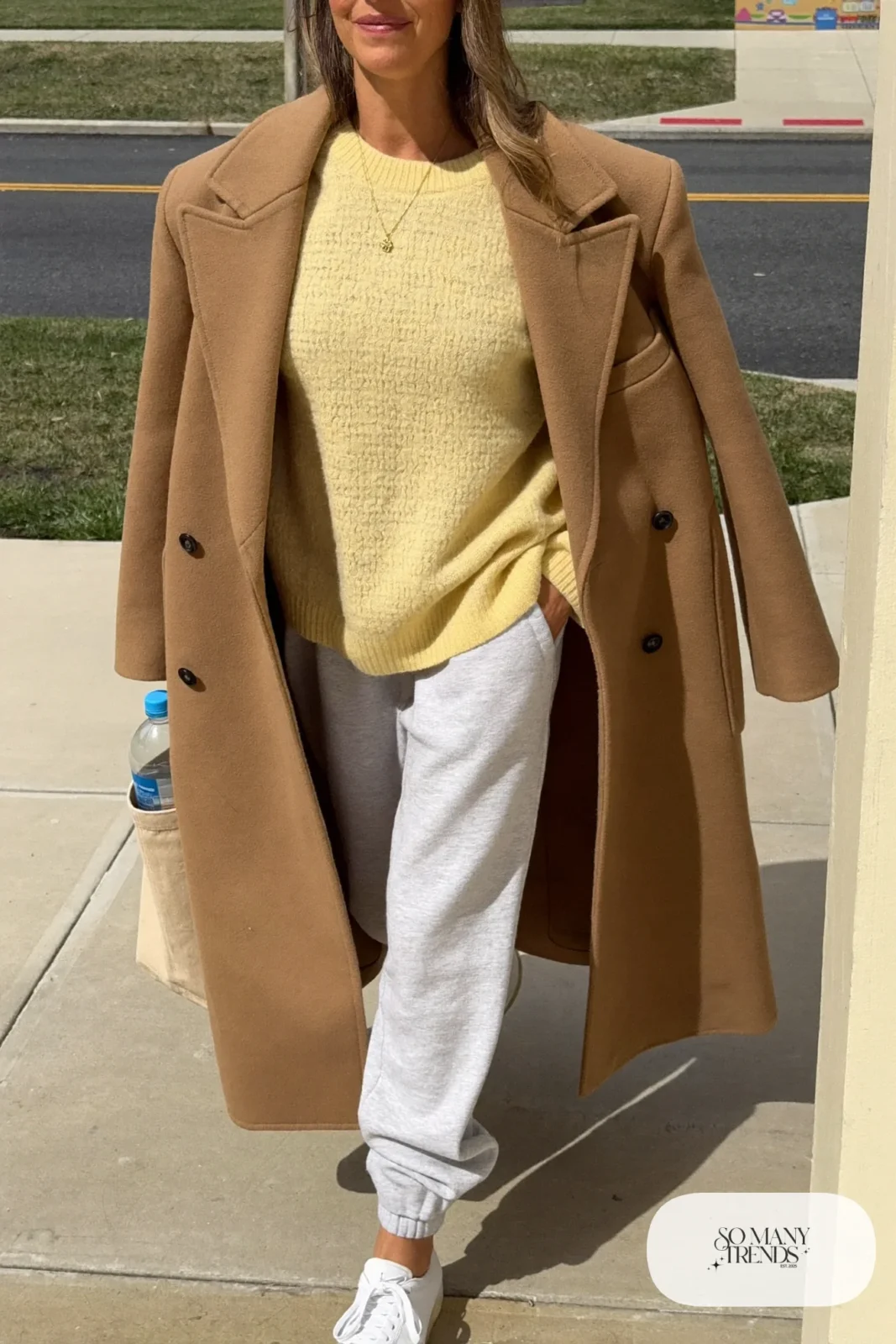 butter yellow sweater heather gray joggers long camel coat white sneakers school run outfit 6