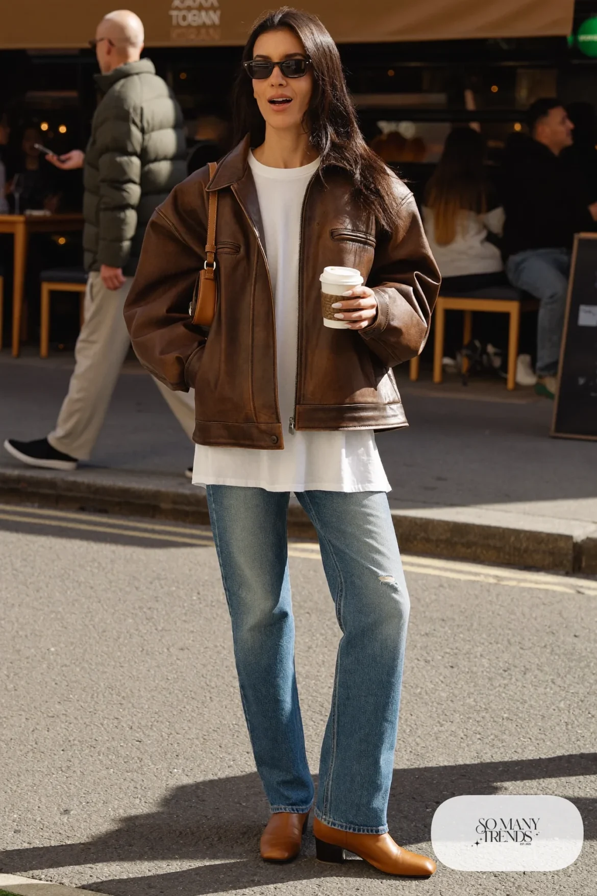 chocolate brown leather jacket white tee straight blue jeans low heel boots small bag errand outfit 19