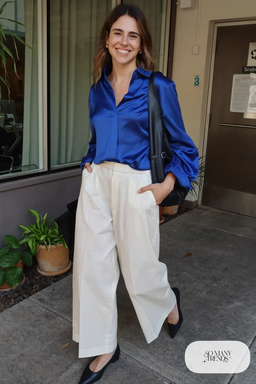 cobalt blue satin blouse cream wide-leg pants pointed flats structured bag dressed-up daytime outfit 25