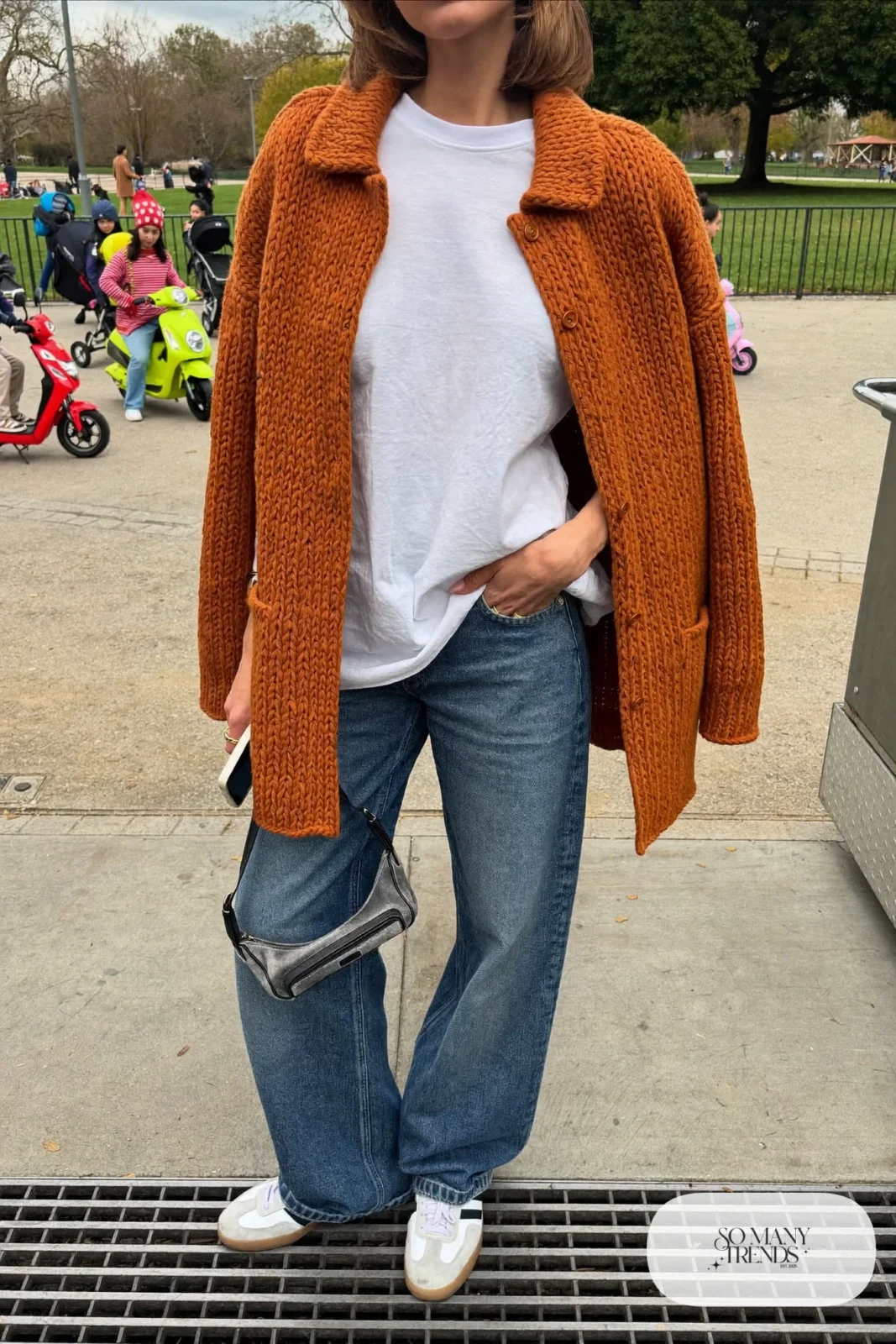 rust chunky cardigan white tee barrel leg jeans gray sneakers crossbody bag outfit 3