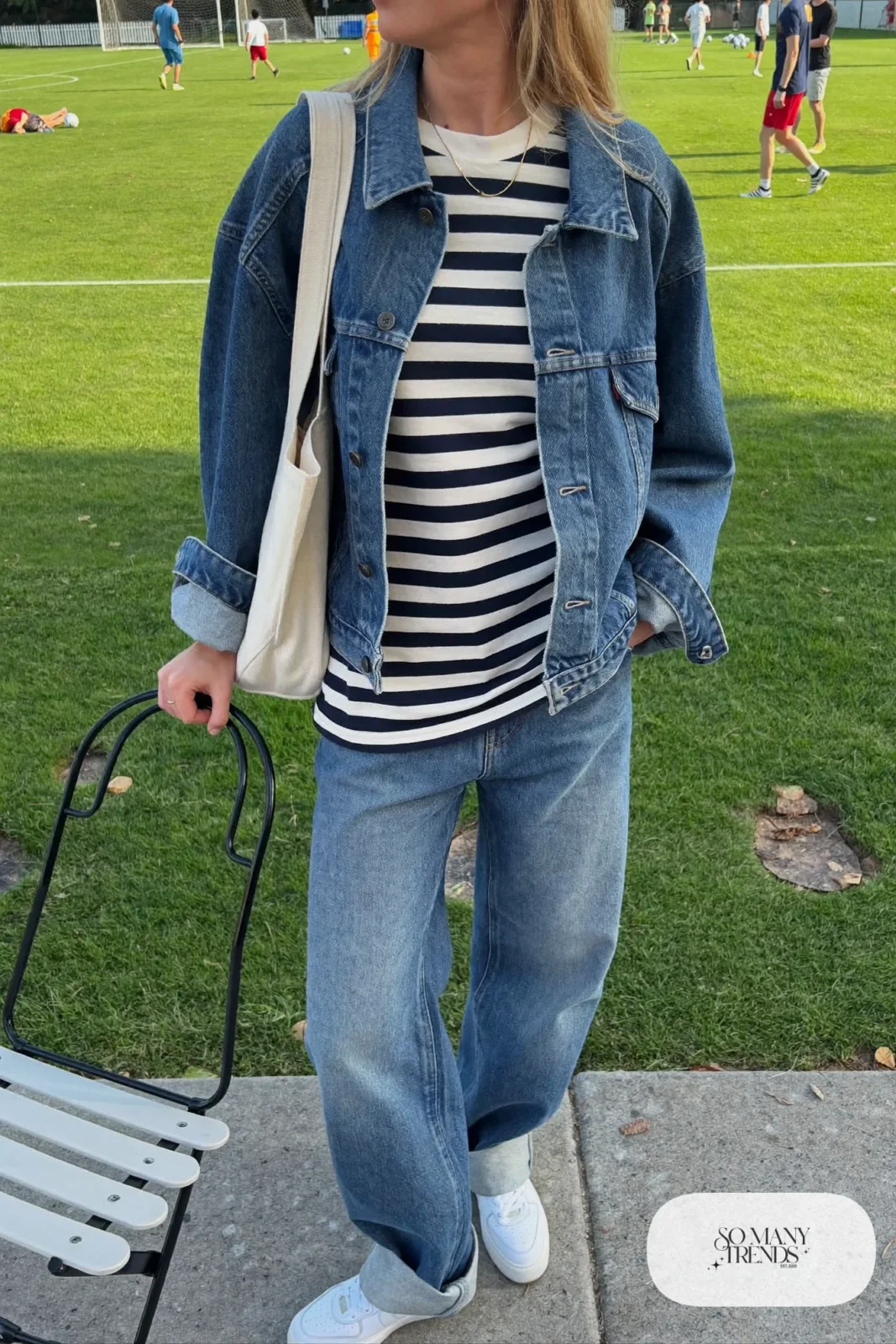boxy denim jacket navy striped tee relaxed straight jeans white sneakers tote outfit 13