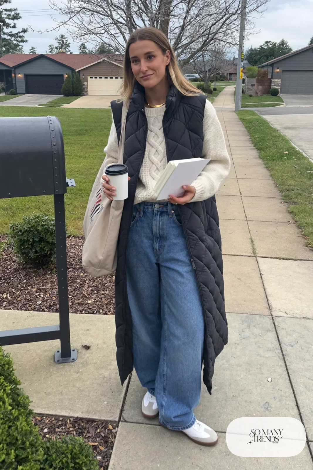charcoal long vest cream knit sweater wide leg jeans white sneakers tote outfit 29