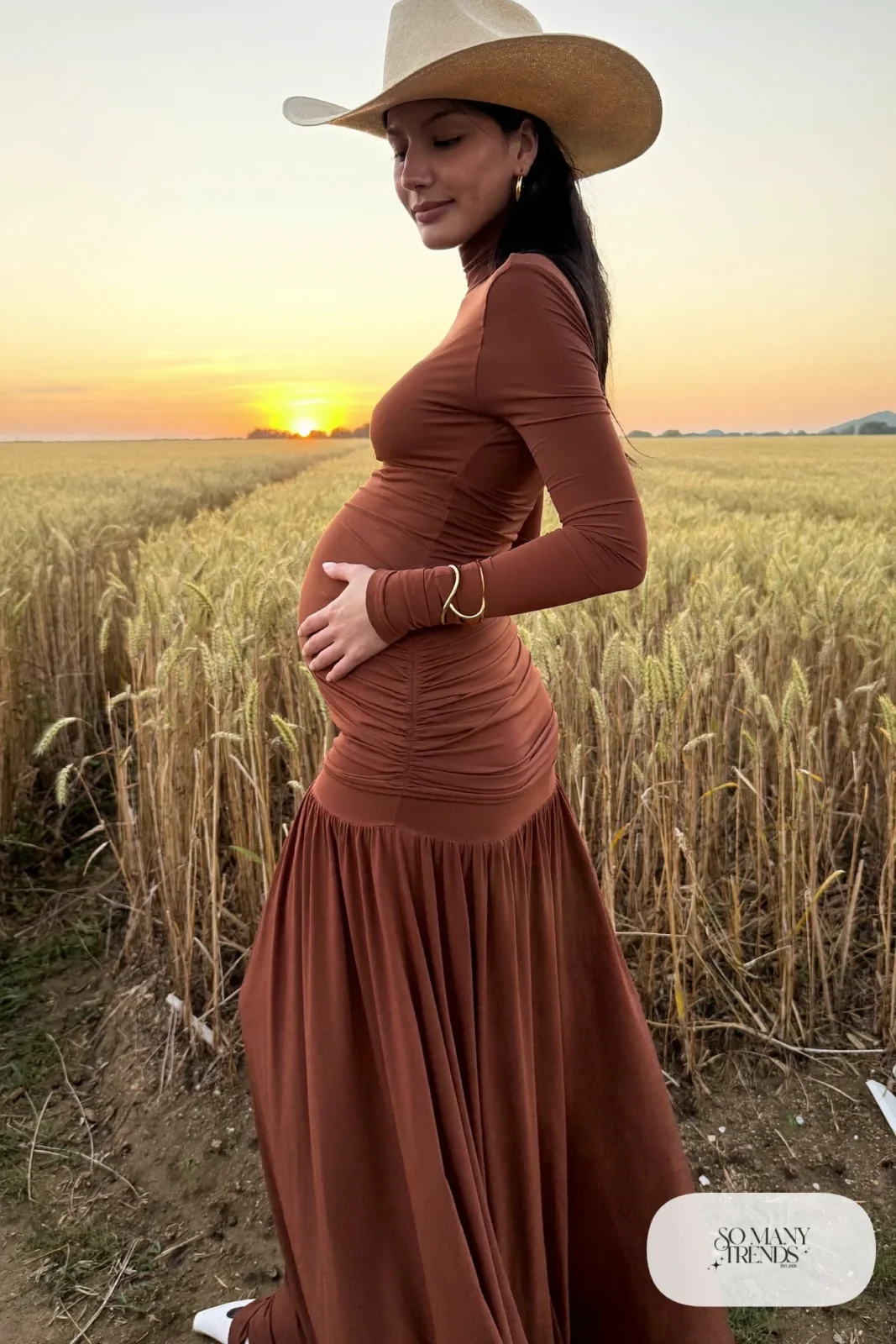 terracotta maternity maxi dress straw hat gold bangles field photo 1