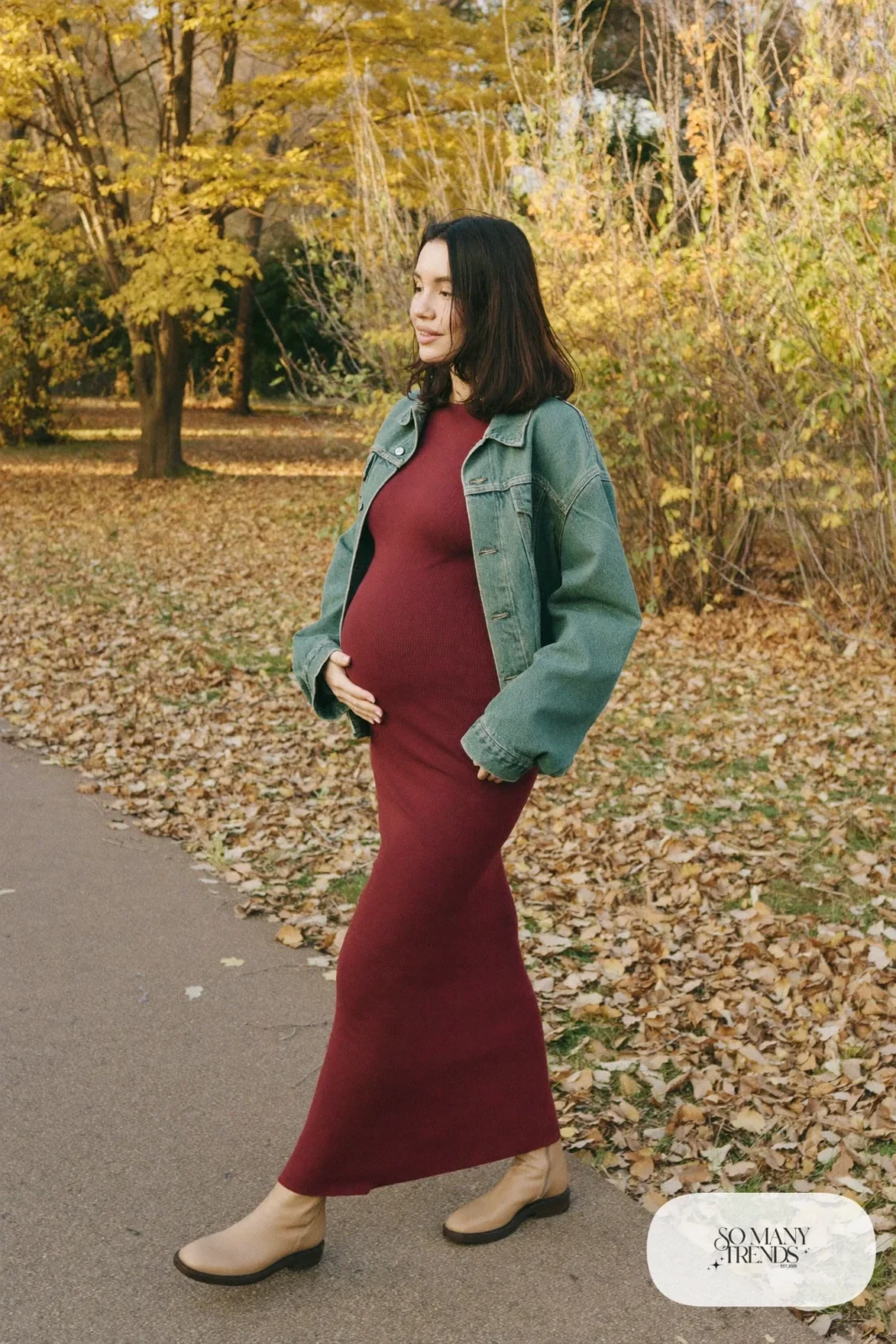 rust ribbed maternity midi dress boxy denim jacket ankle boots autumn field photo 11