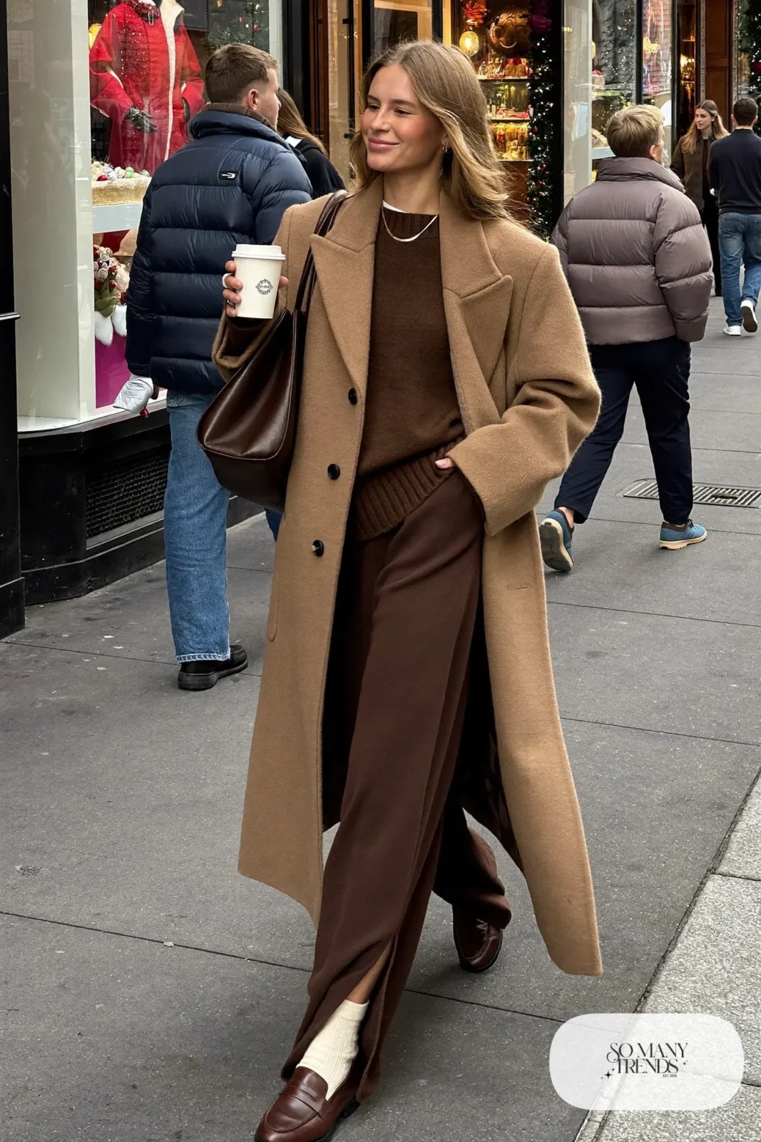 chocolate brown knit sweater wide-leg knit pants camel long coat loafers tote bag outfit 1