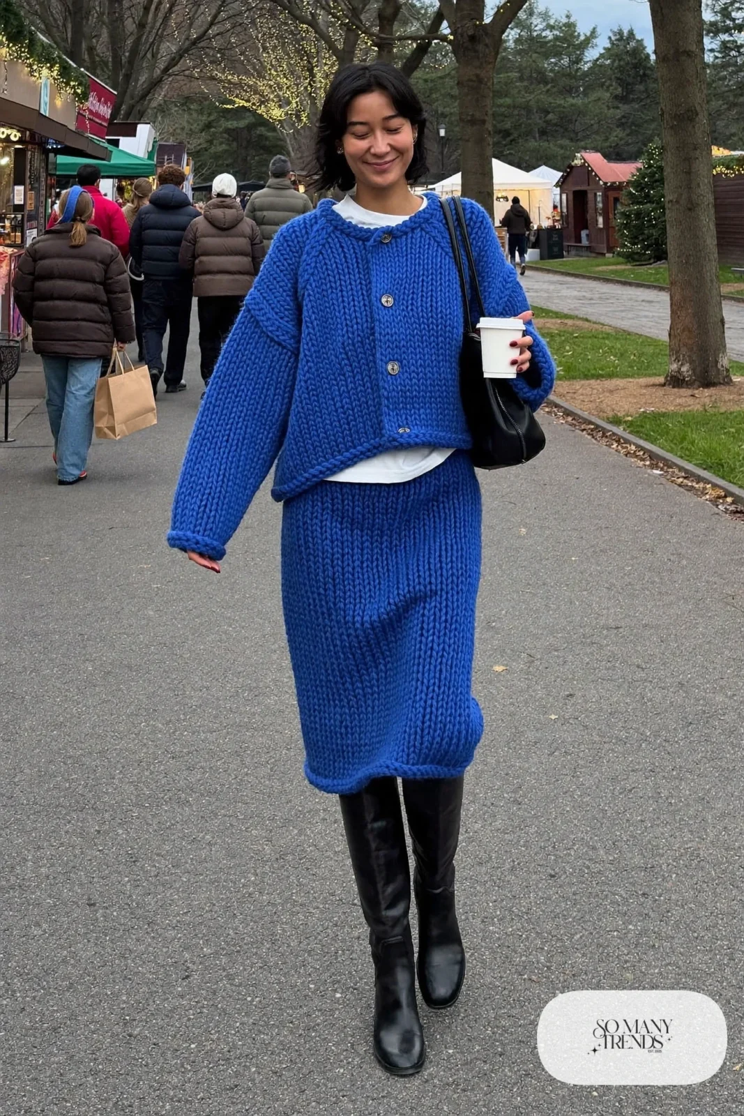 cobalt blue boxy cardigan matching knit midi skirt black knee-high boots shoulder bag outfit 2
