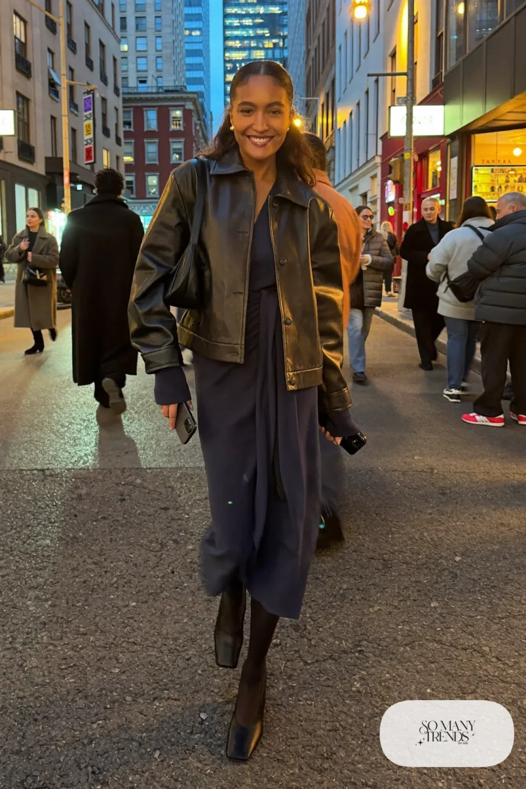 navy wrap midi dress boxy black leather jacket black block heel pumps small shoulder bag outfit 7