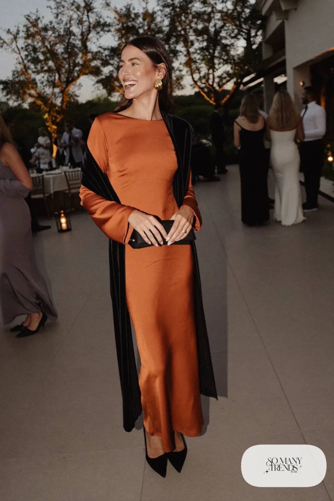 rust satin long sleeve maxi dress black velvet wrap closed toe pointed pumps gold earrings clutch outfit 21