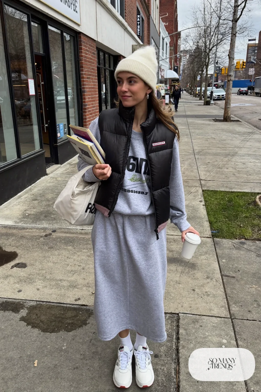 heather gray sweatshirt midi dress black puffer vest chunky white sneakers beanie tote outfit 23
