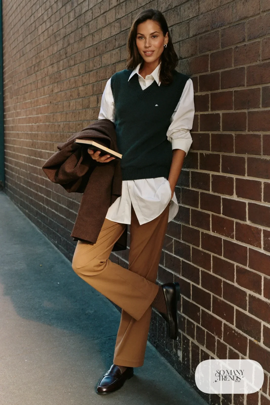 forest green knit vest white poplin shirt straight camel pants brown loafers outfit 4