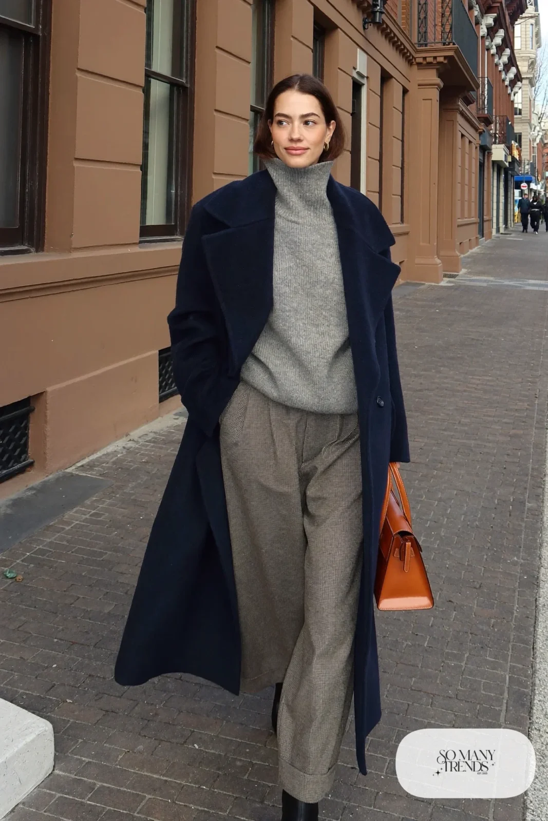 navy long peacoat gray roll neck sweater gray flannel pants leather boots structured bag outfit 10