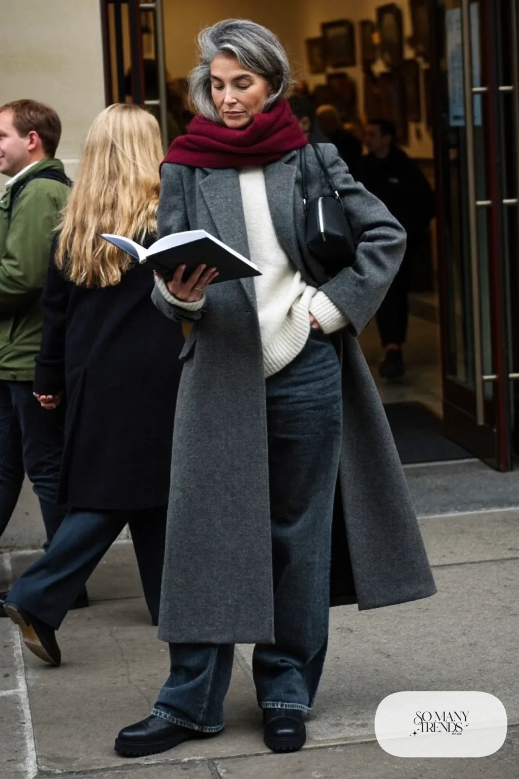 long charcoal wool coat cream sweater dark wide-leg jeans leather boots shoulder bag outfit 23