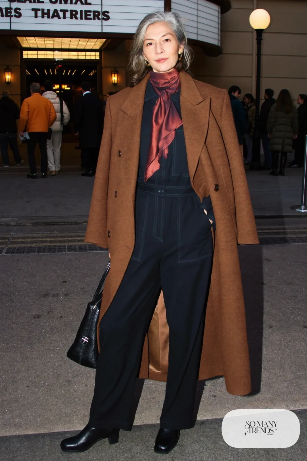 black wide-leg jumpsuit camel wrap coat rust silk scarf block heels leather bag outfit 29